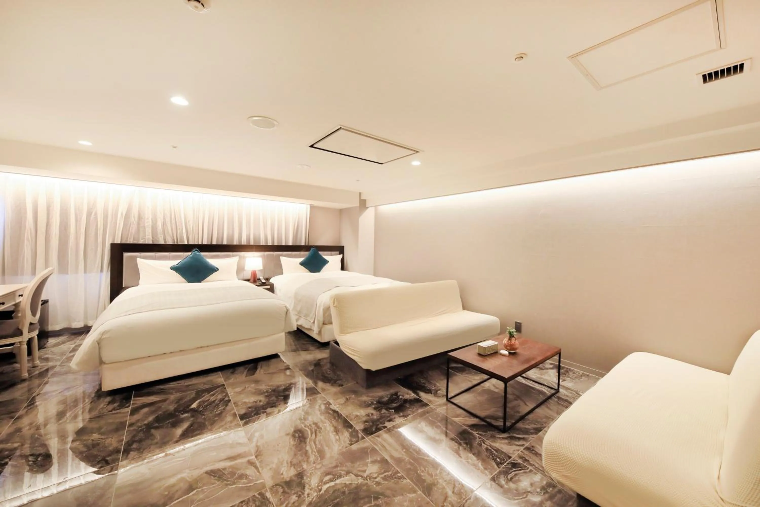 Living room, Bed in QuintessaHotel SapporoSusukino63 Relax&Spa