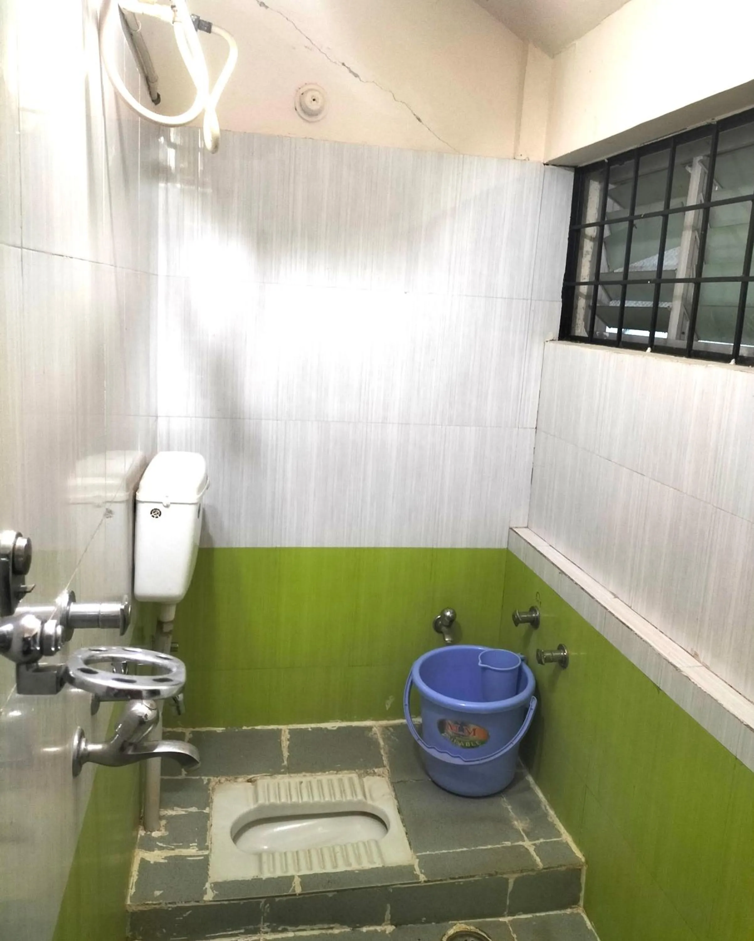 Bathroom in KSTDC Hotel Mayura TalaKaveri, Bhagamandala