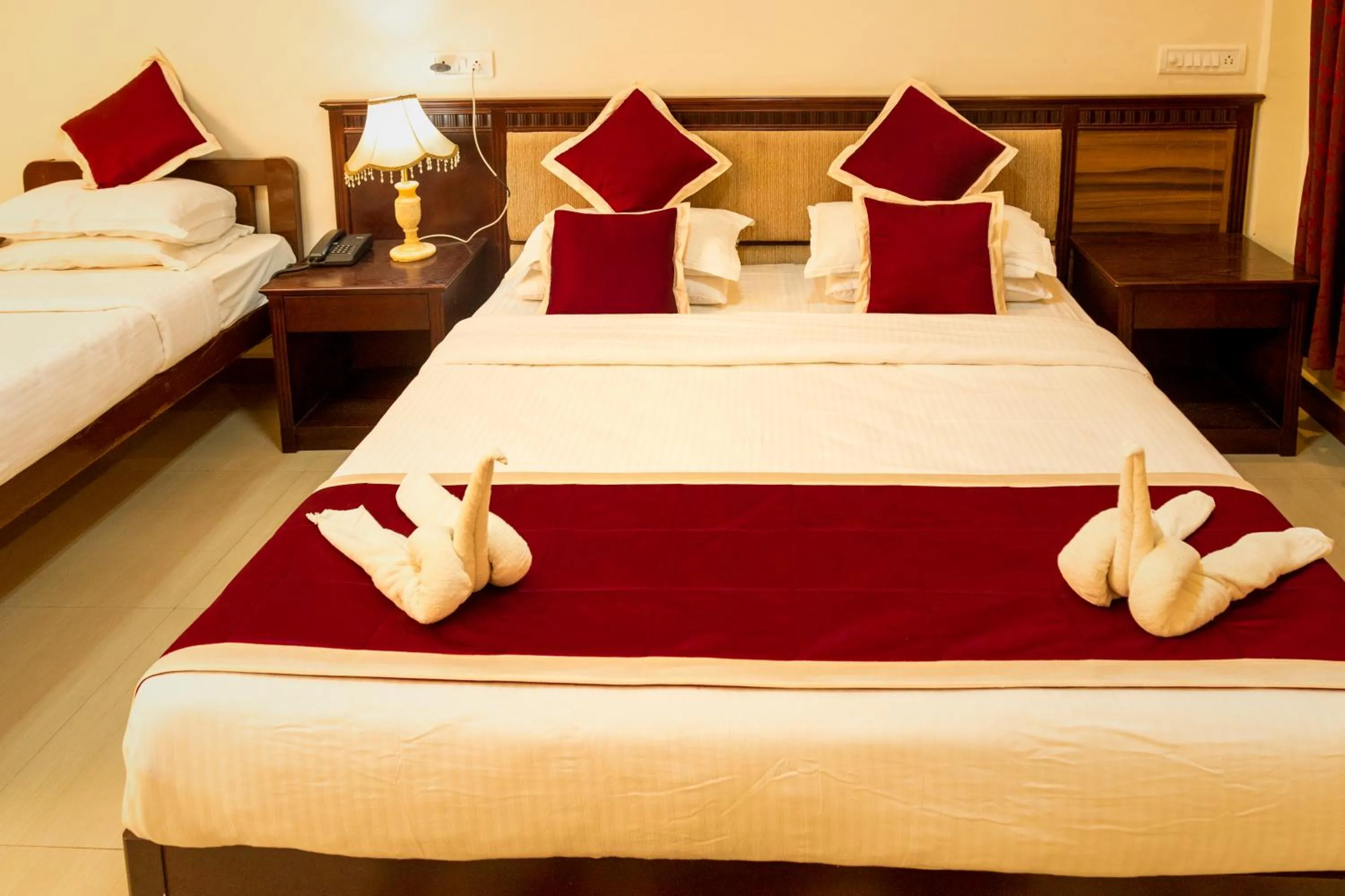 Bed in KSTDC Hotel Mayura Chalukya, Badami
