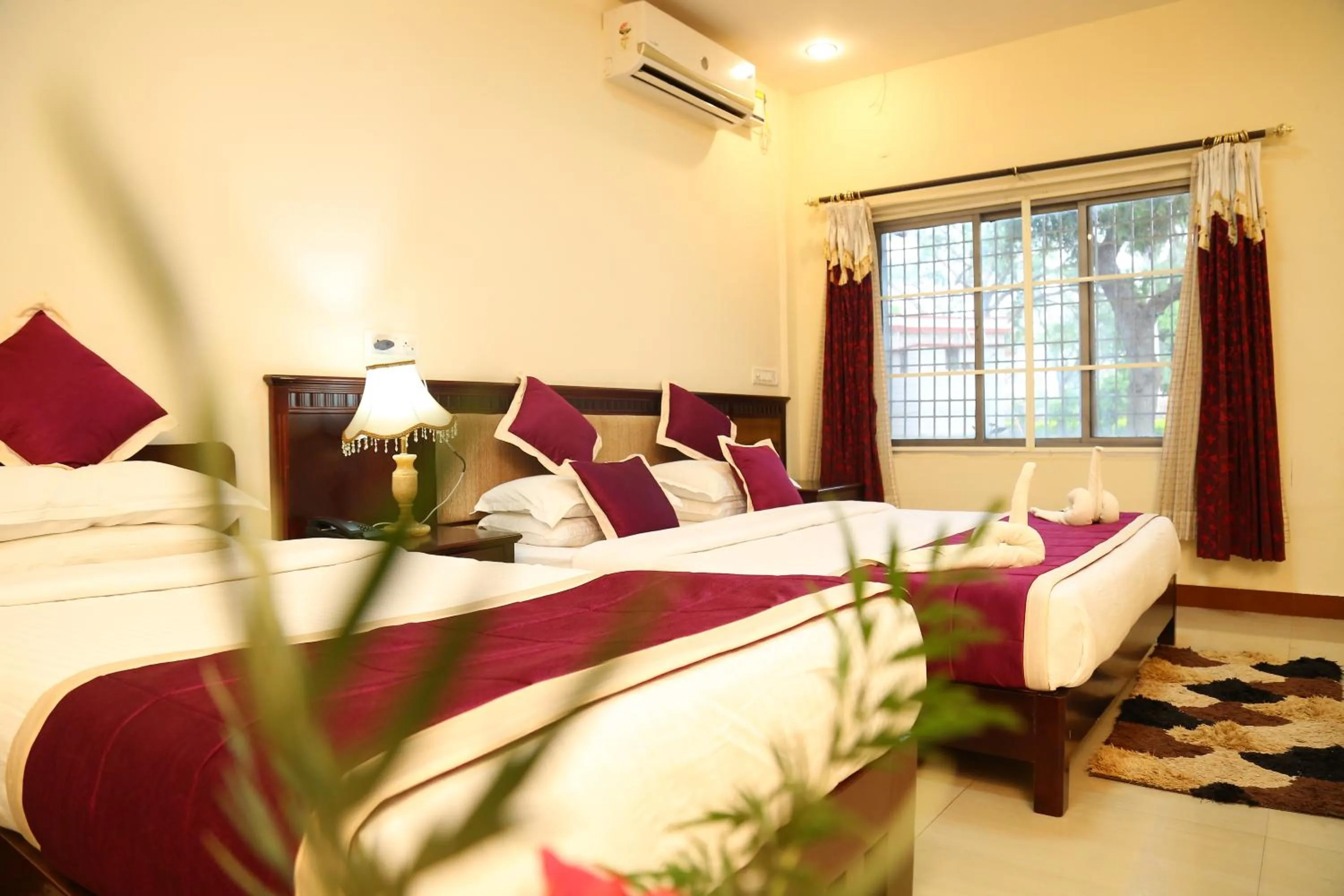 Bed in KSTDC Hotel Mayura Chalukya, Badami