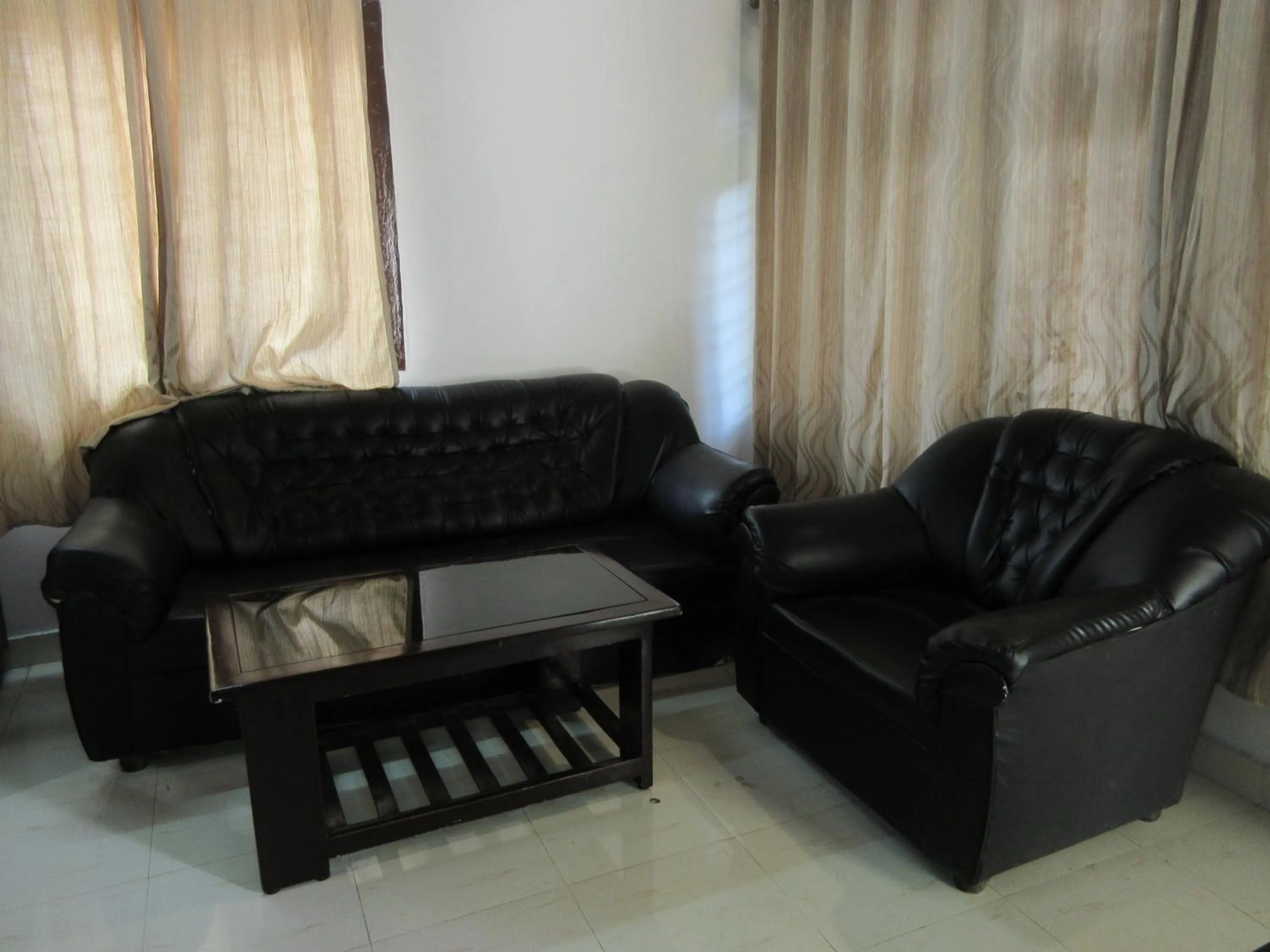 Living room in KSTDC Hotel Mayura Velapuri Belur