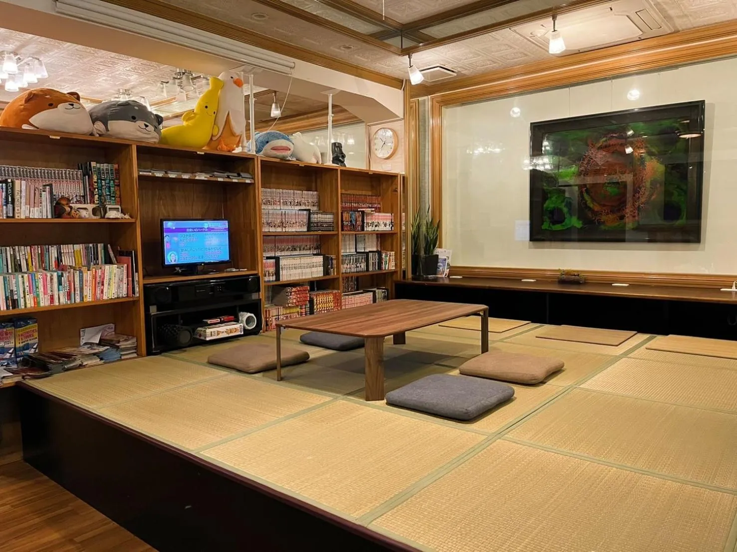 Communal lounge/ TV room in Guest House Umikaji
