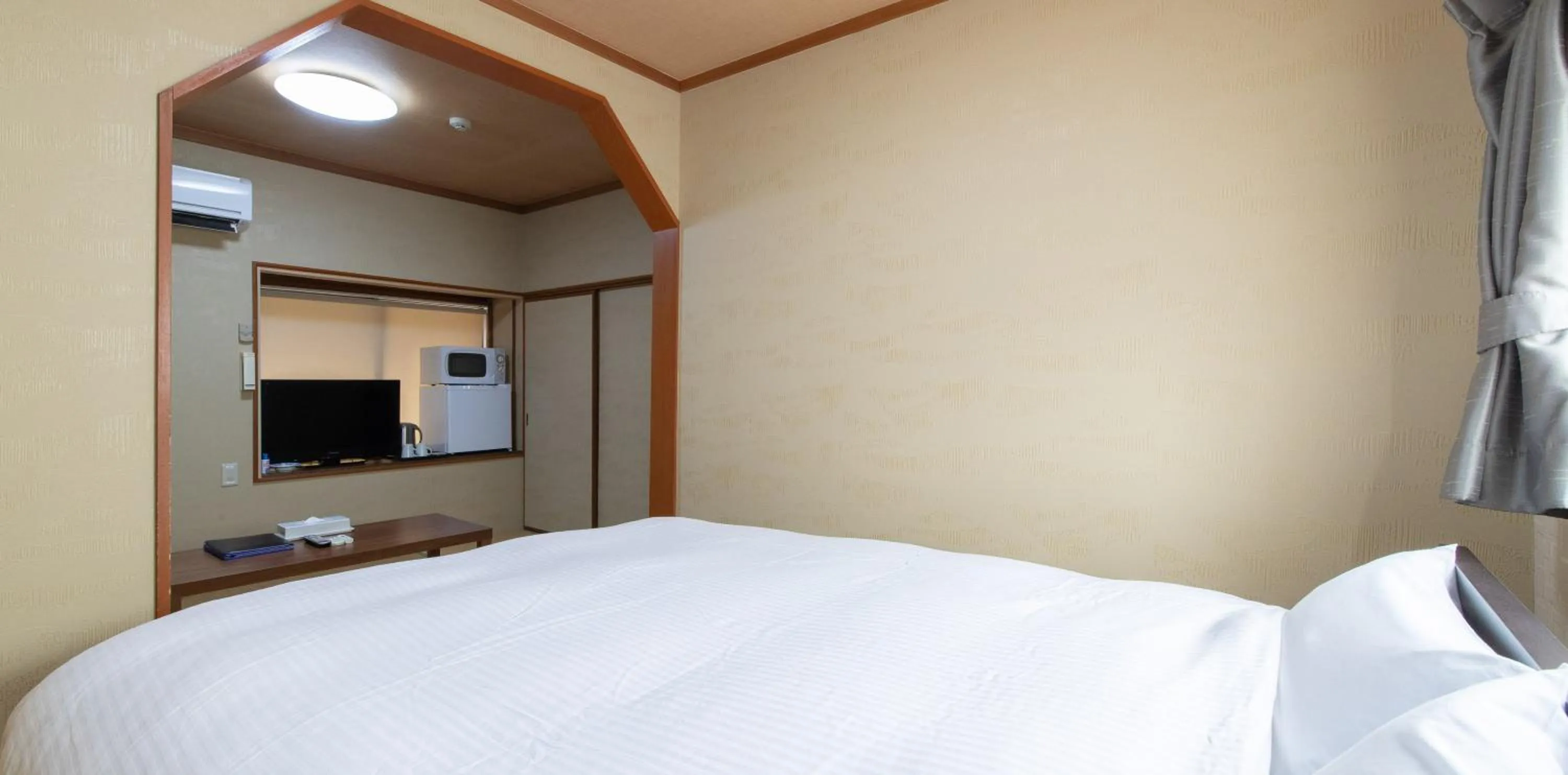 Photo of the whole room, Bed in Tabist Yamaga Onsen Yuyado Izumi