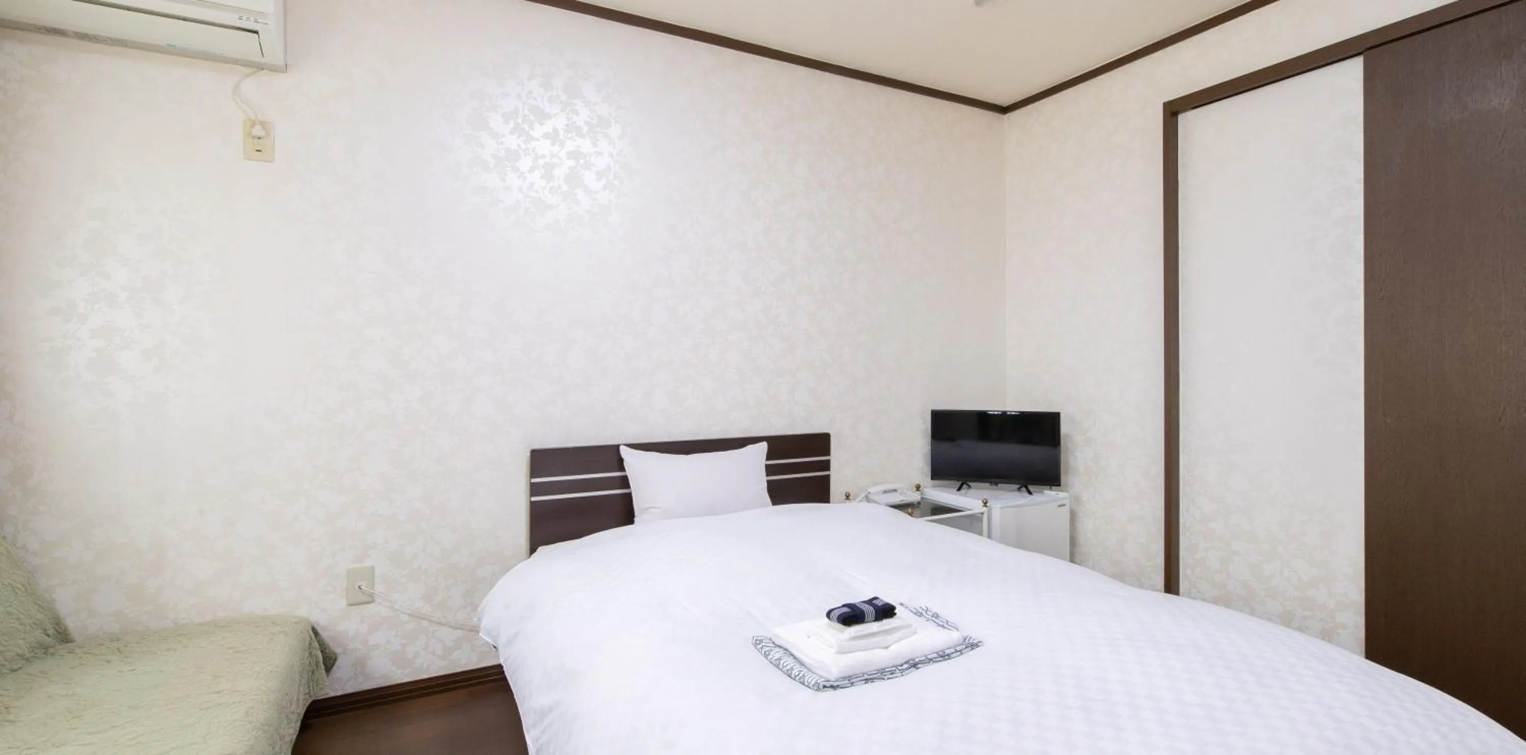 Photo of the whole room, Bed in Tabist Yamaga Onsen Yuyado Izumi