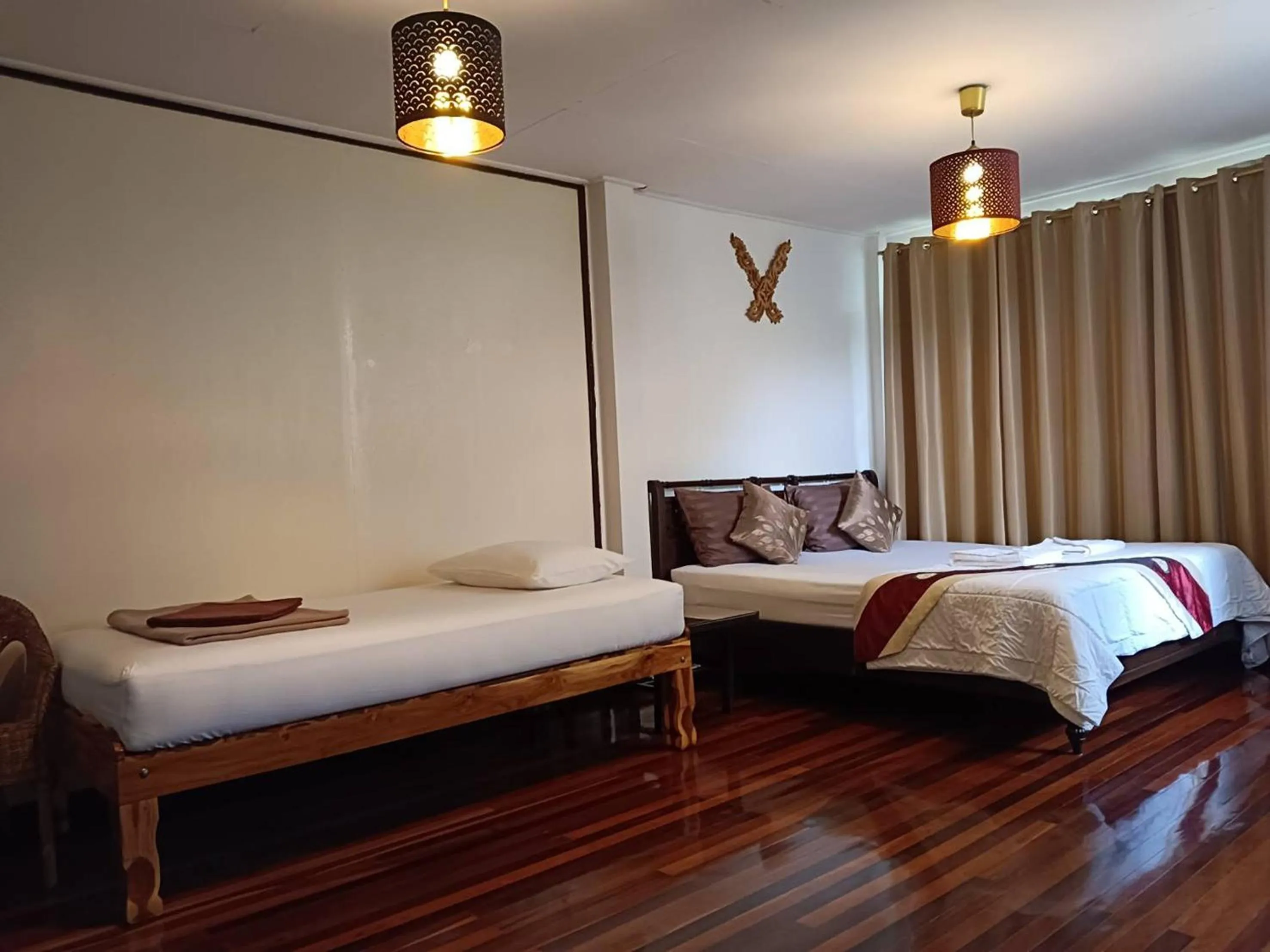 Bed in Naturbliss Resort Village