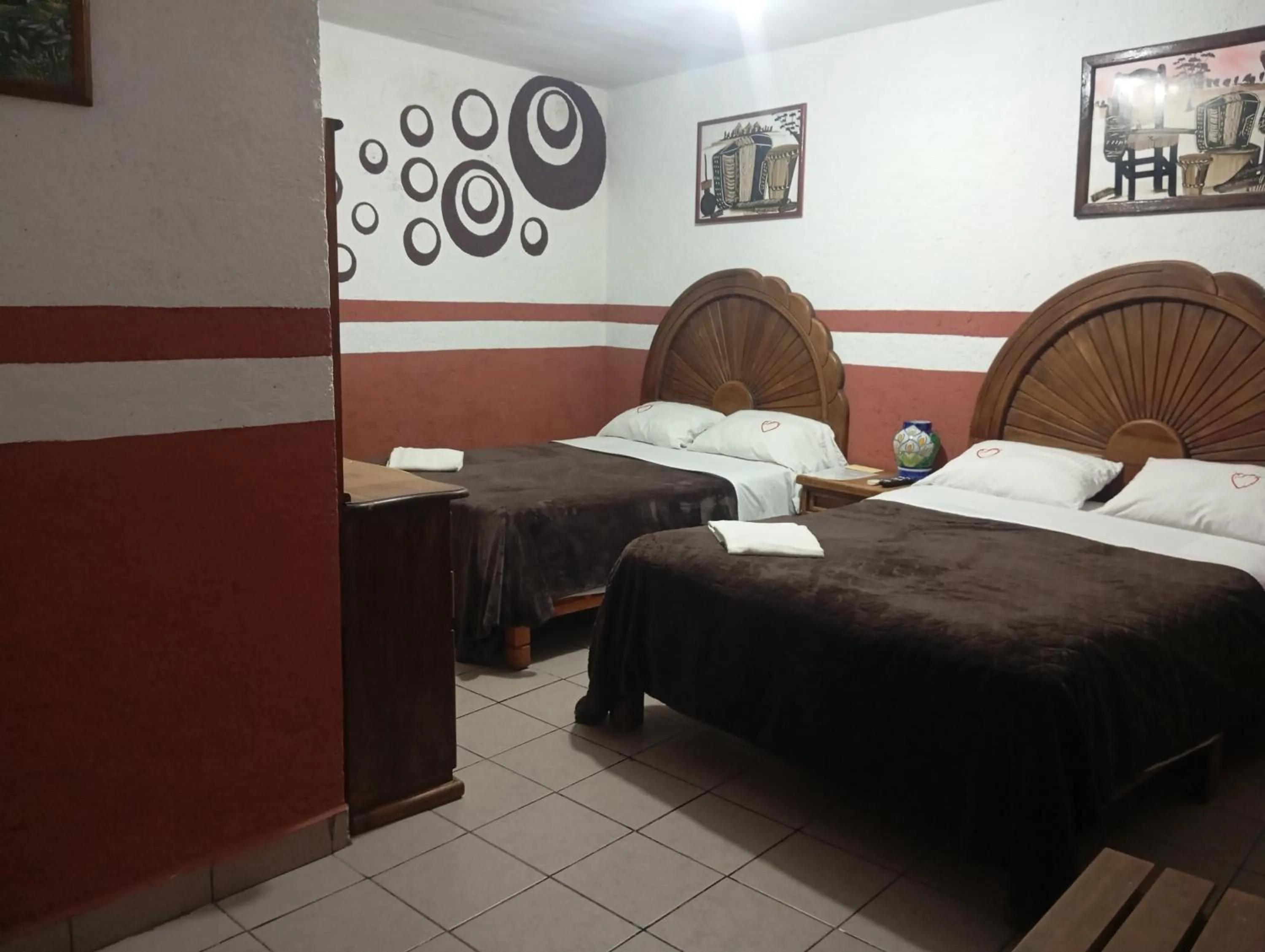 Bed in Hospedaje San Antonio Tepoztlán.