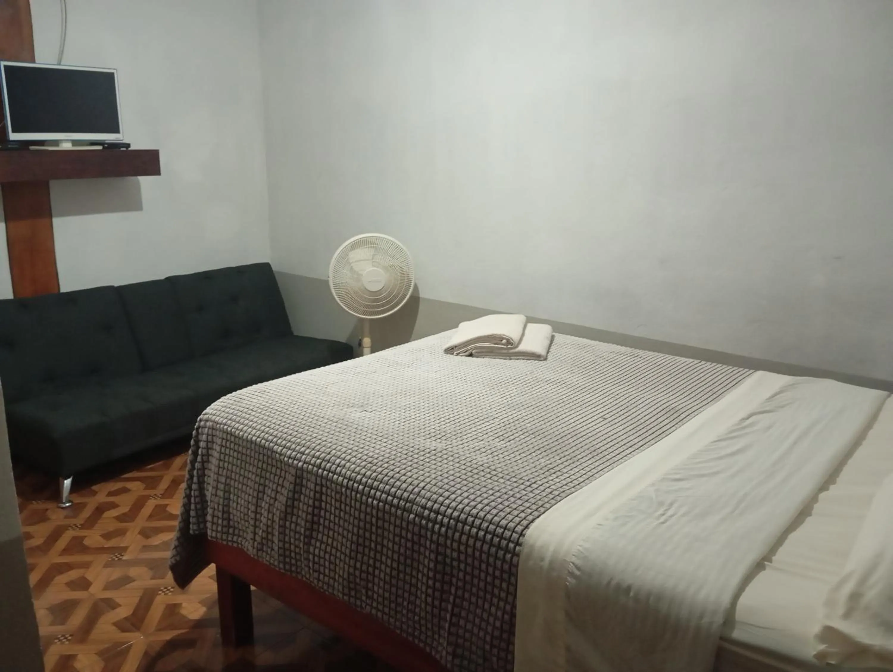 Bed in Hospedaje San Antonio Tepoztlán.