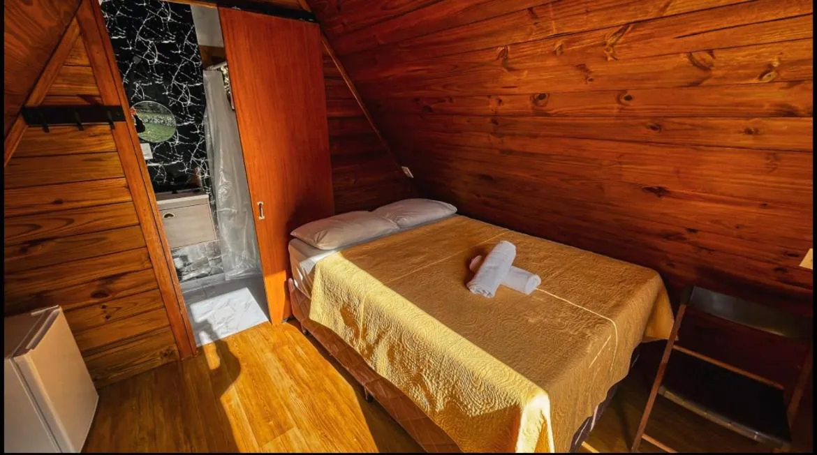 Property building, Bed in Pousada Nosso Bosque