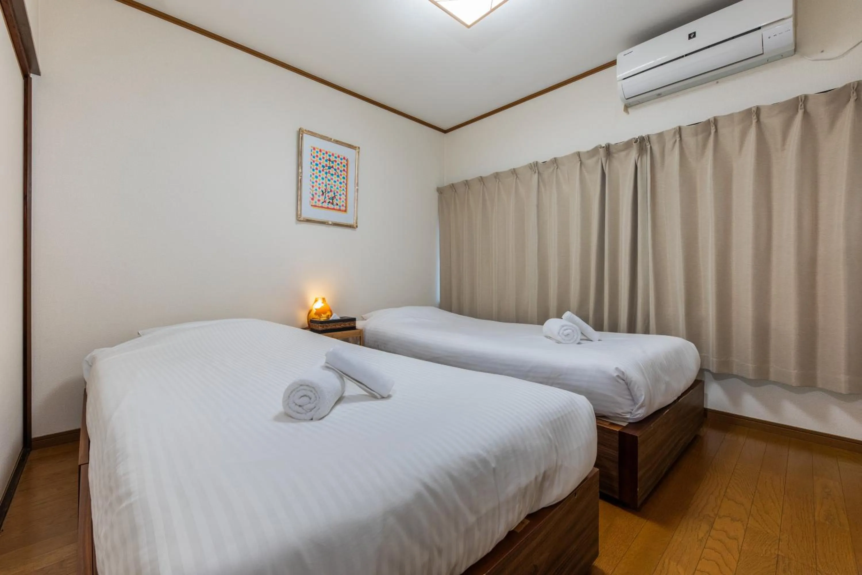 Bed in Shiki Homes HARU