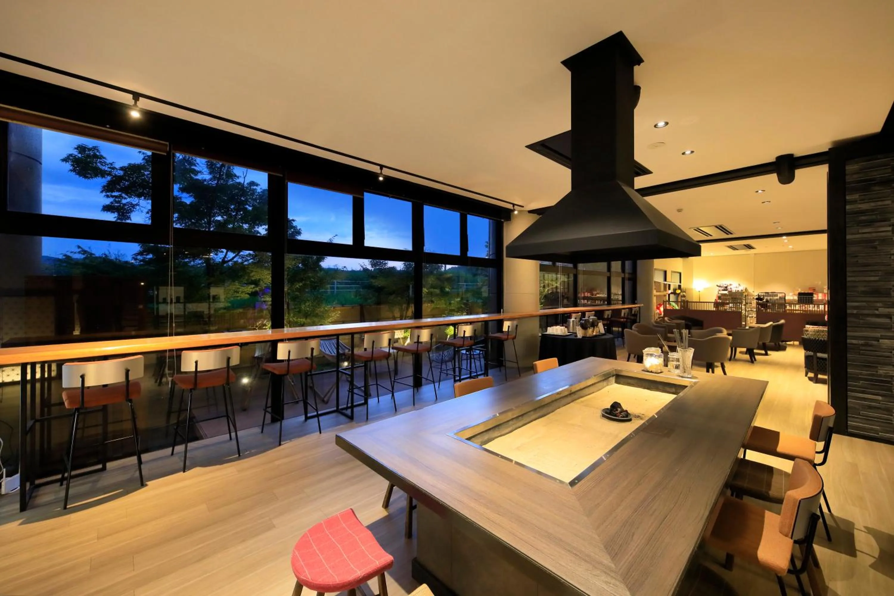 Communal lounge/ TV room in Yutorelo Yamaga