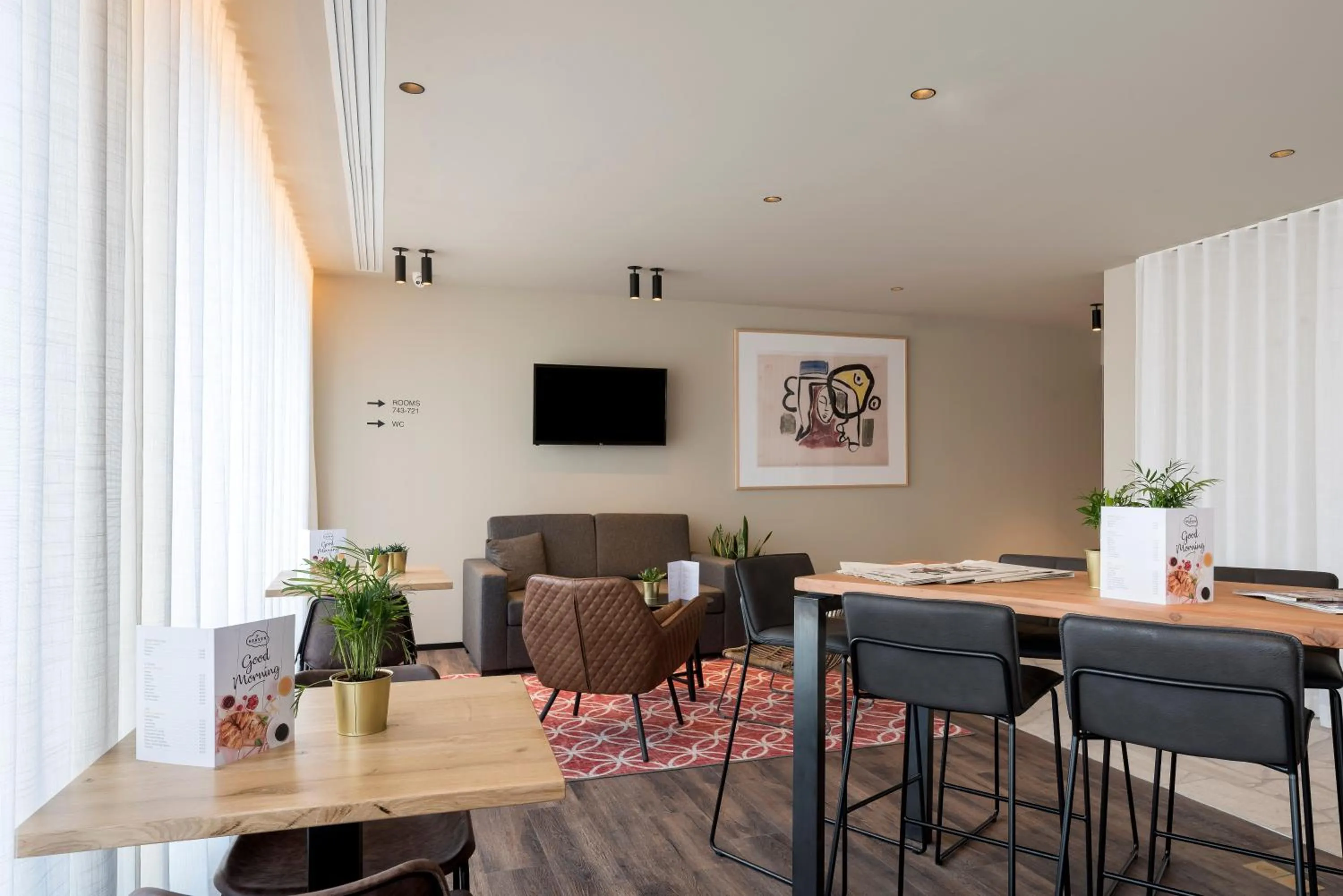 Communal lounge/ TV room in PREMIER SUITES Antwerp