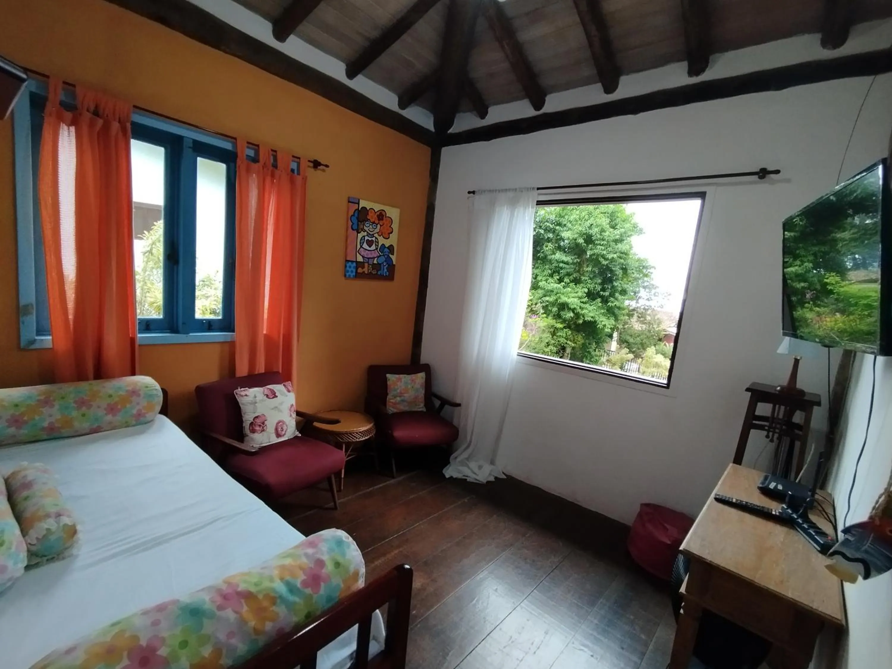 Communal lounge/ TV room in Casa em Ilhabela