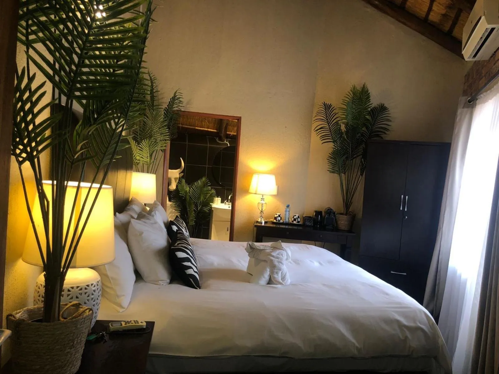 Bed in Imbube Safari Lodge