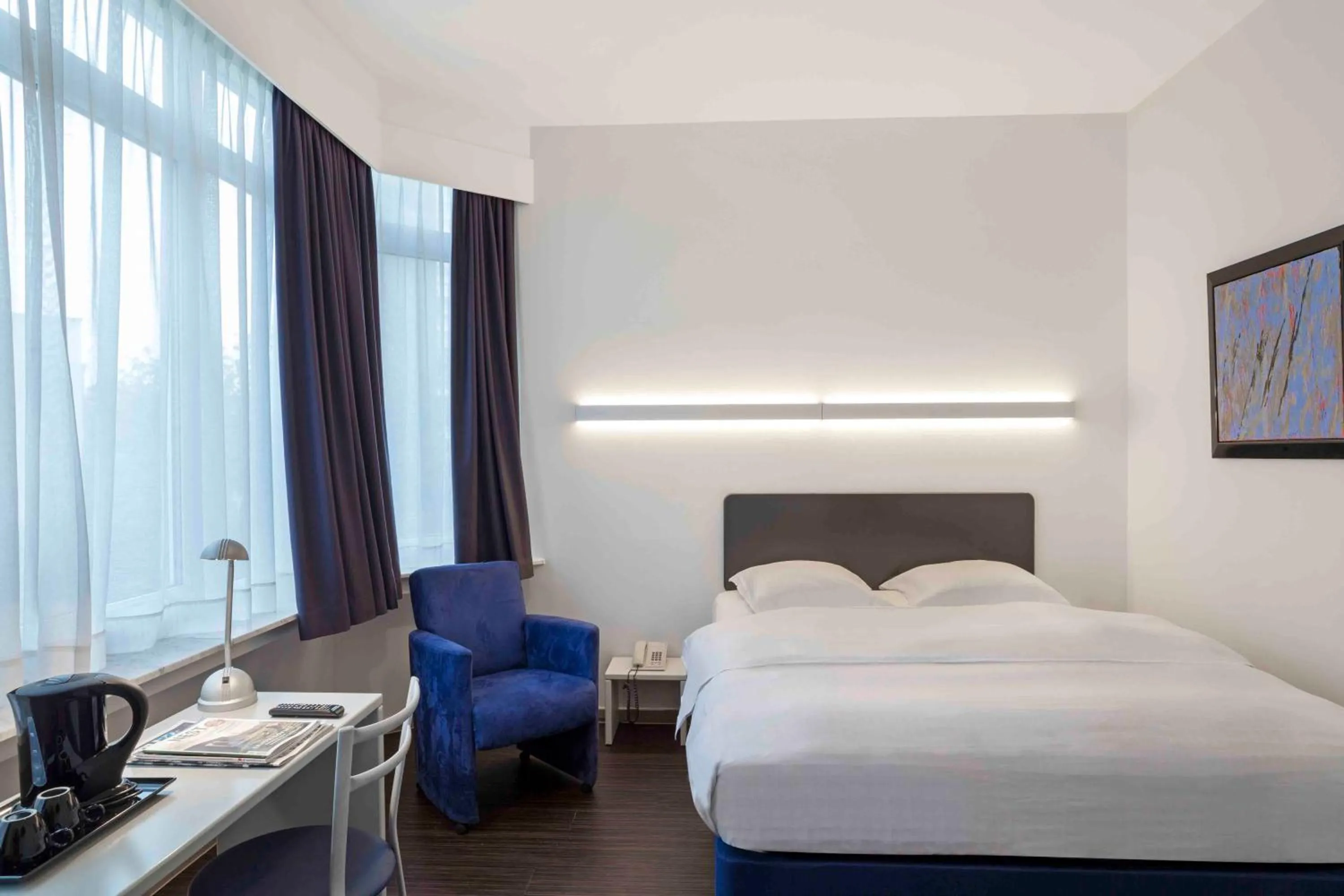 Bed in Hôtel Argus by happyCulture