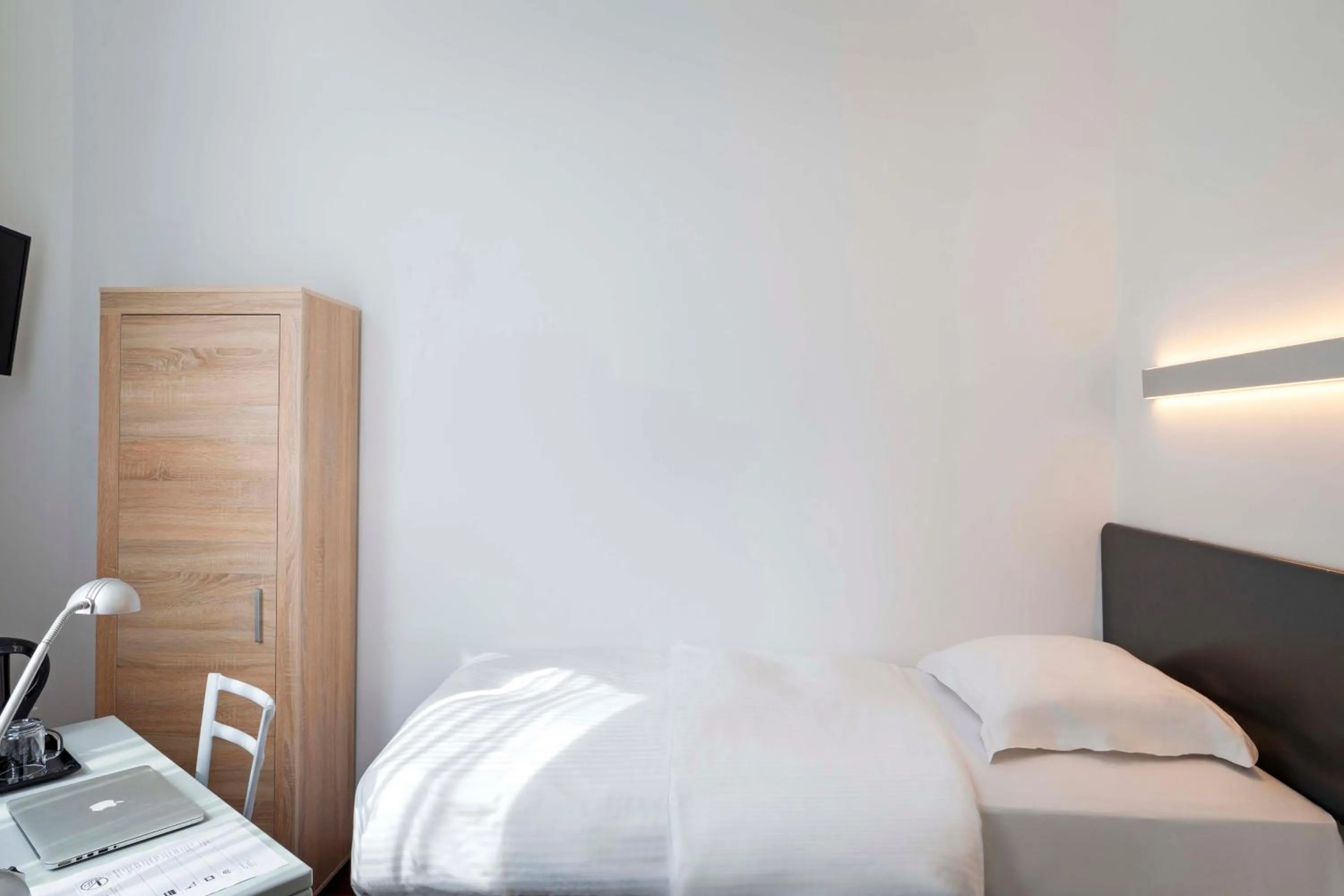 Bed in Hôtel Argus by happyCulture