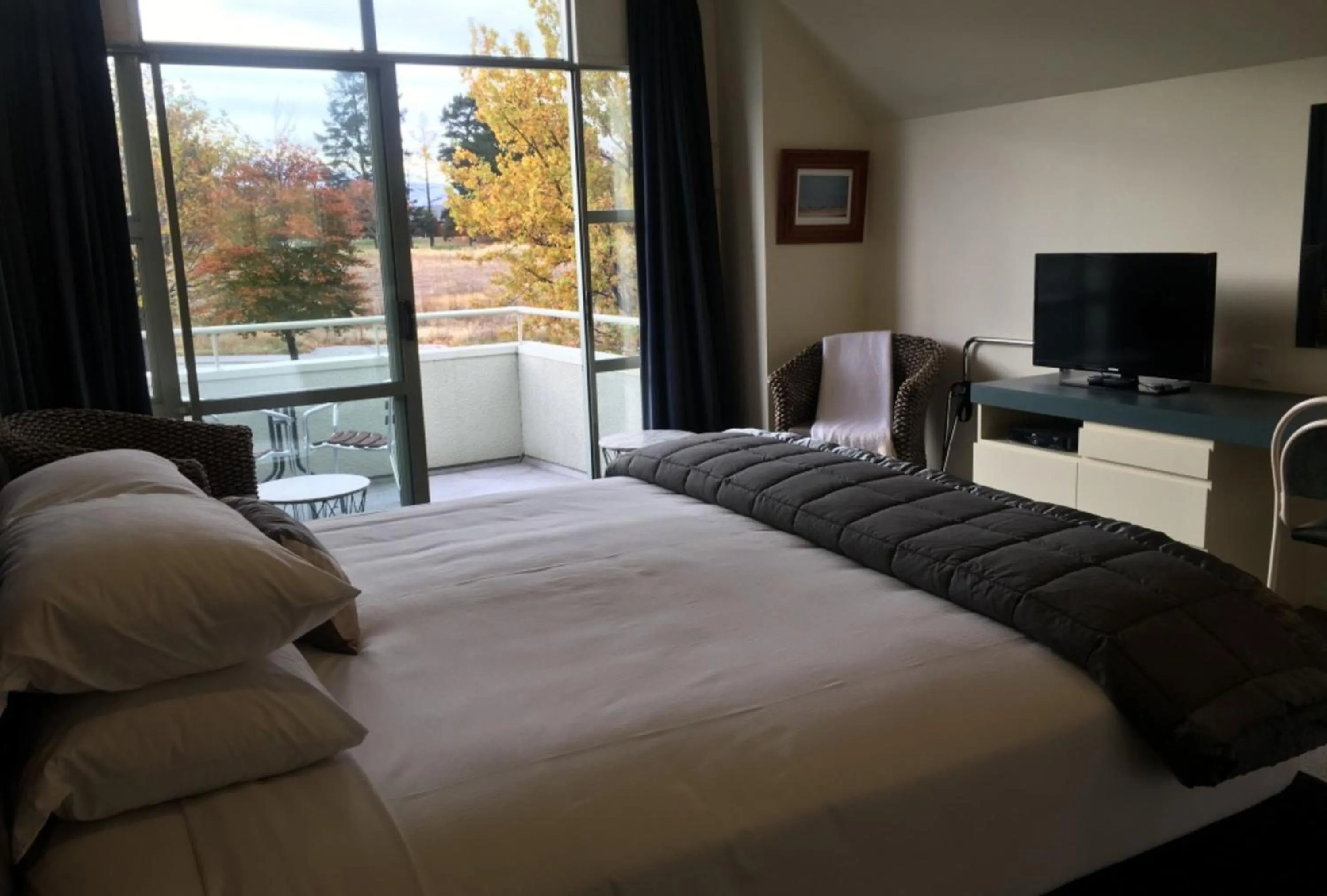 Bed in Colonial Manor Motel