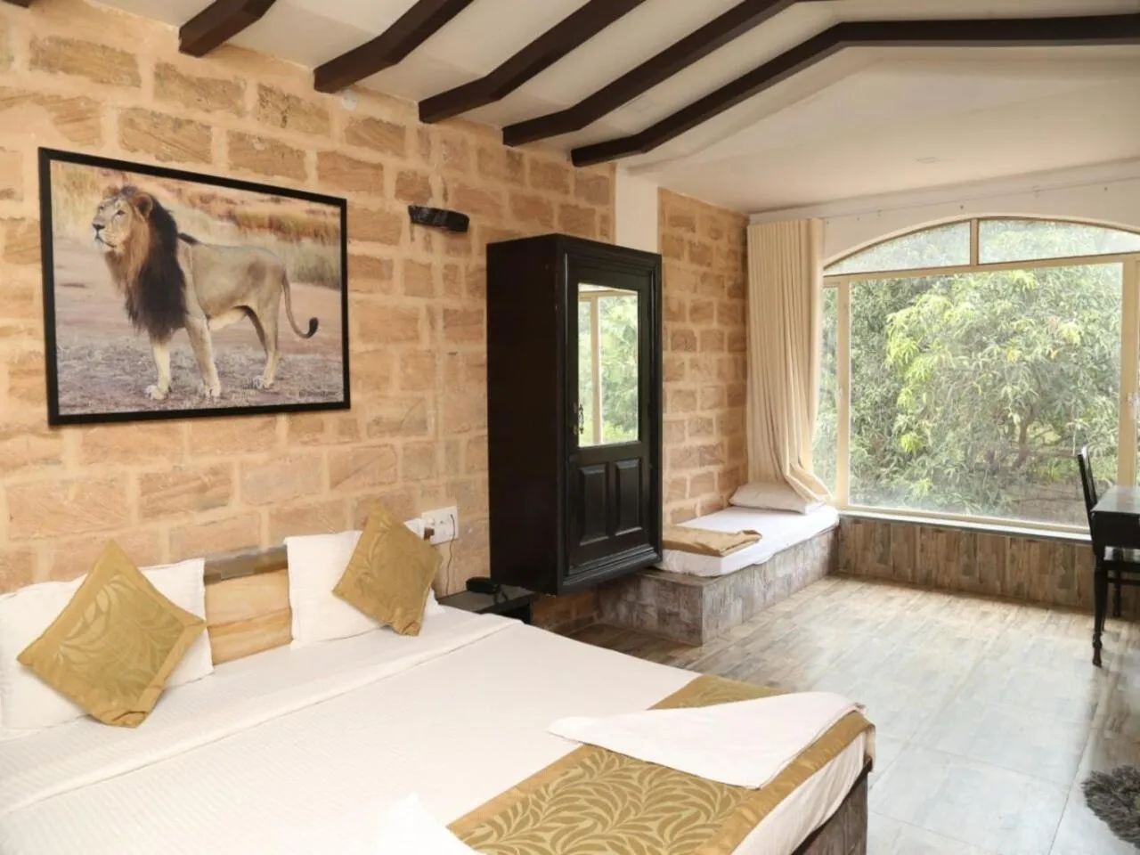 Bedroom, Bed in Gir Lions Paw Resort with Swimming Pool
