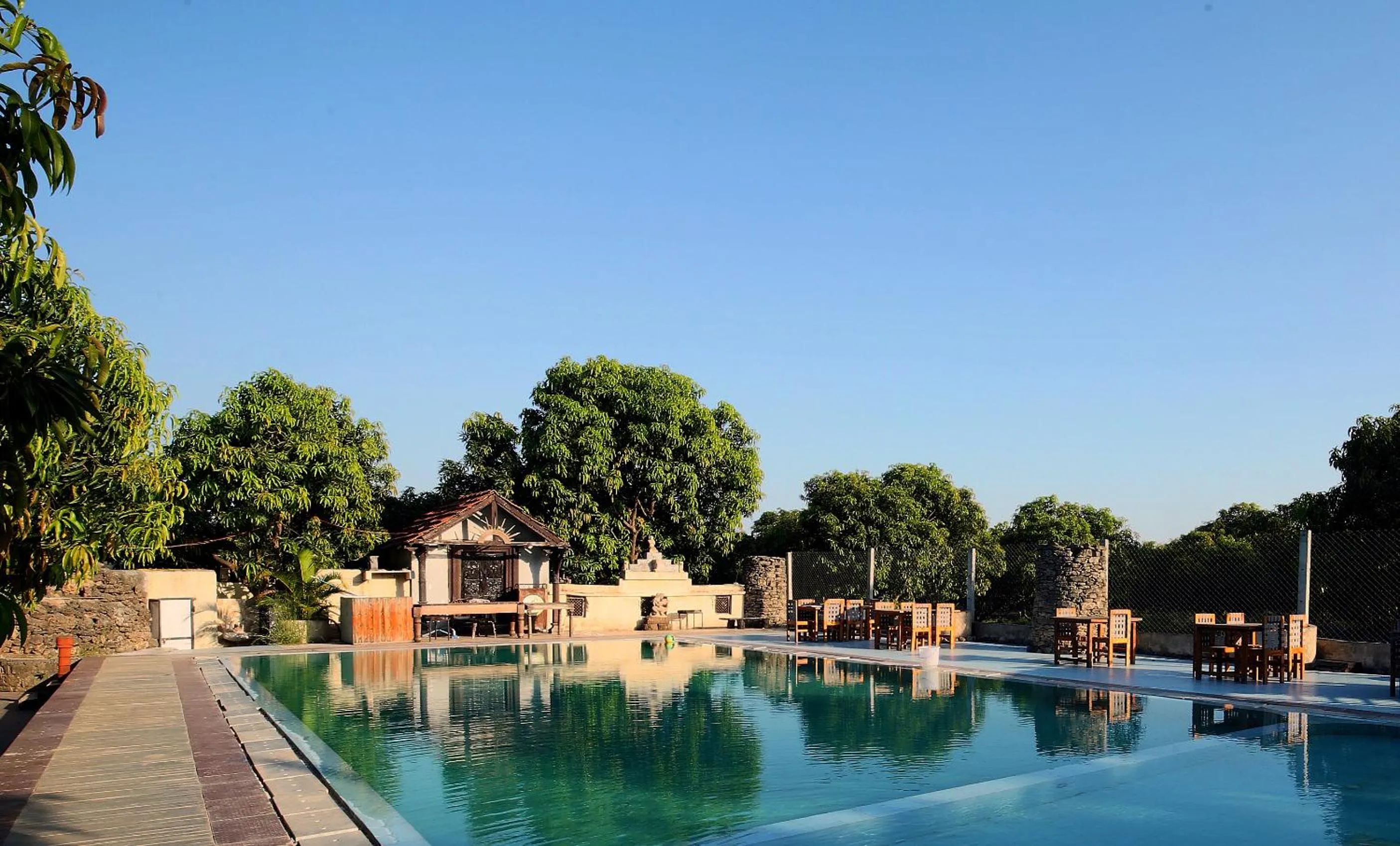 Pool view in Gir Lions Paw Resort with Swimming Pool
