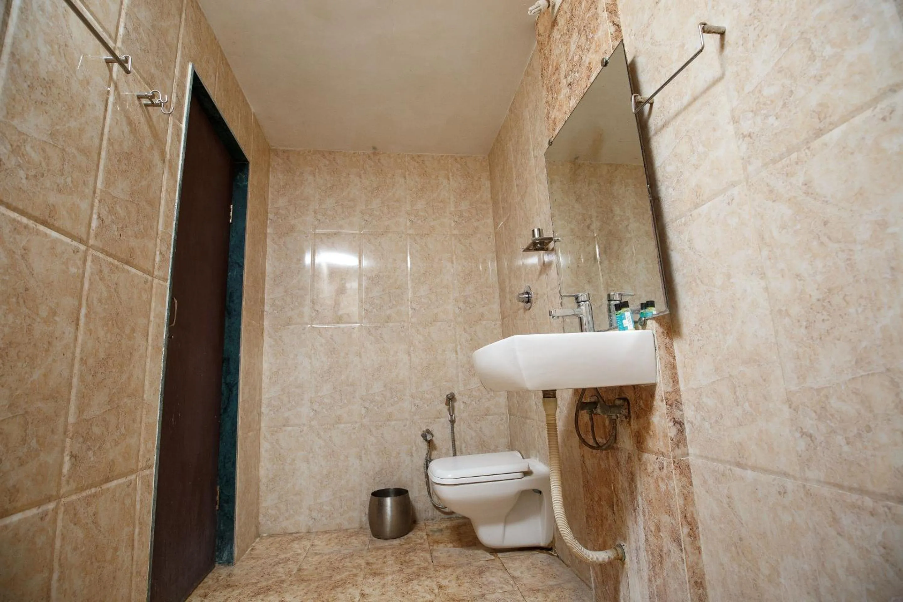 Bathroom in Gir Lions Paw Resort with Swimming Pool