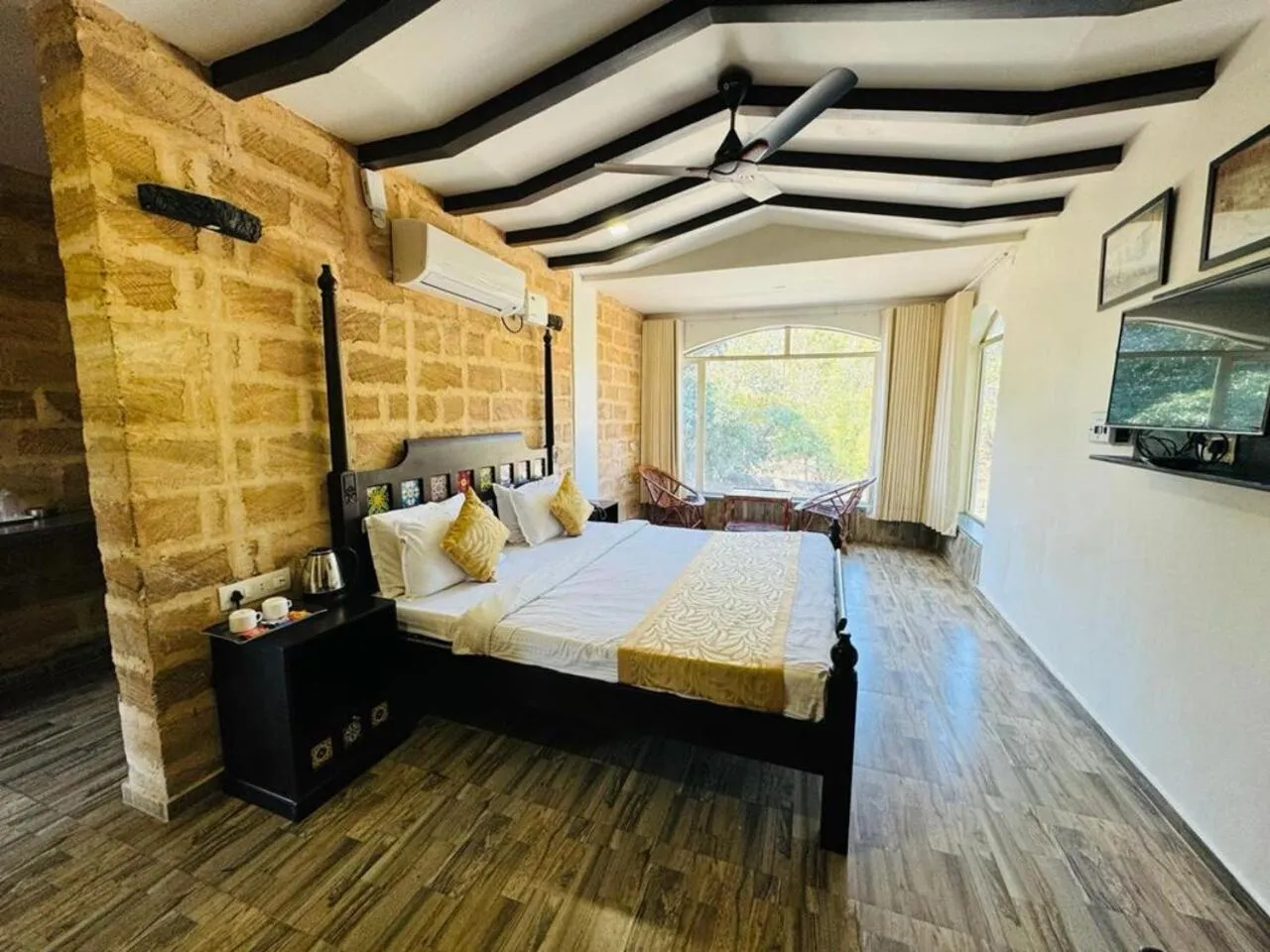 Bedroom, Bed in Gir Lions Paw Resort with Swimming Pool