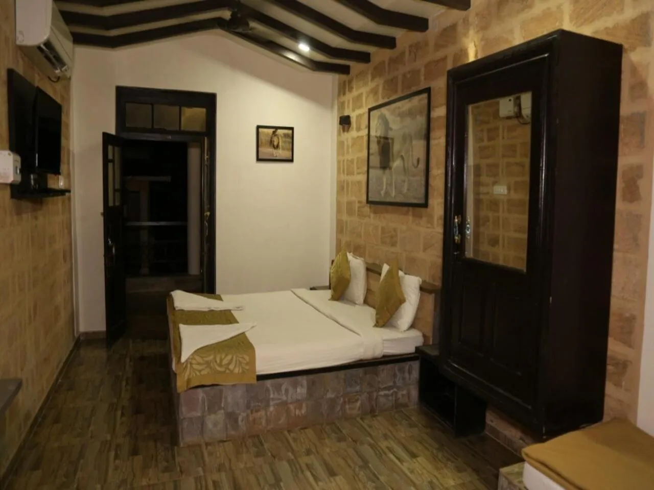 Bedroom, Bed in Gir Lions Paw Resort with Swimming Pool