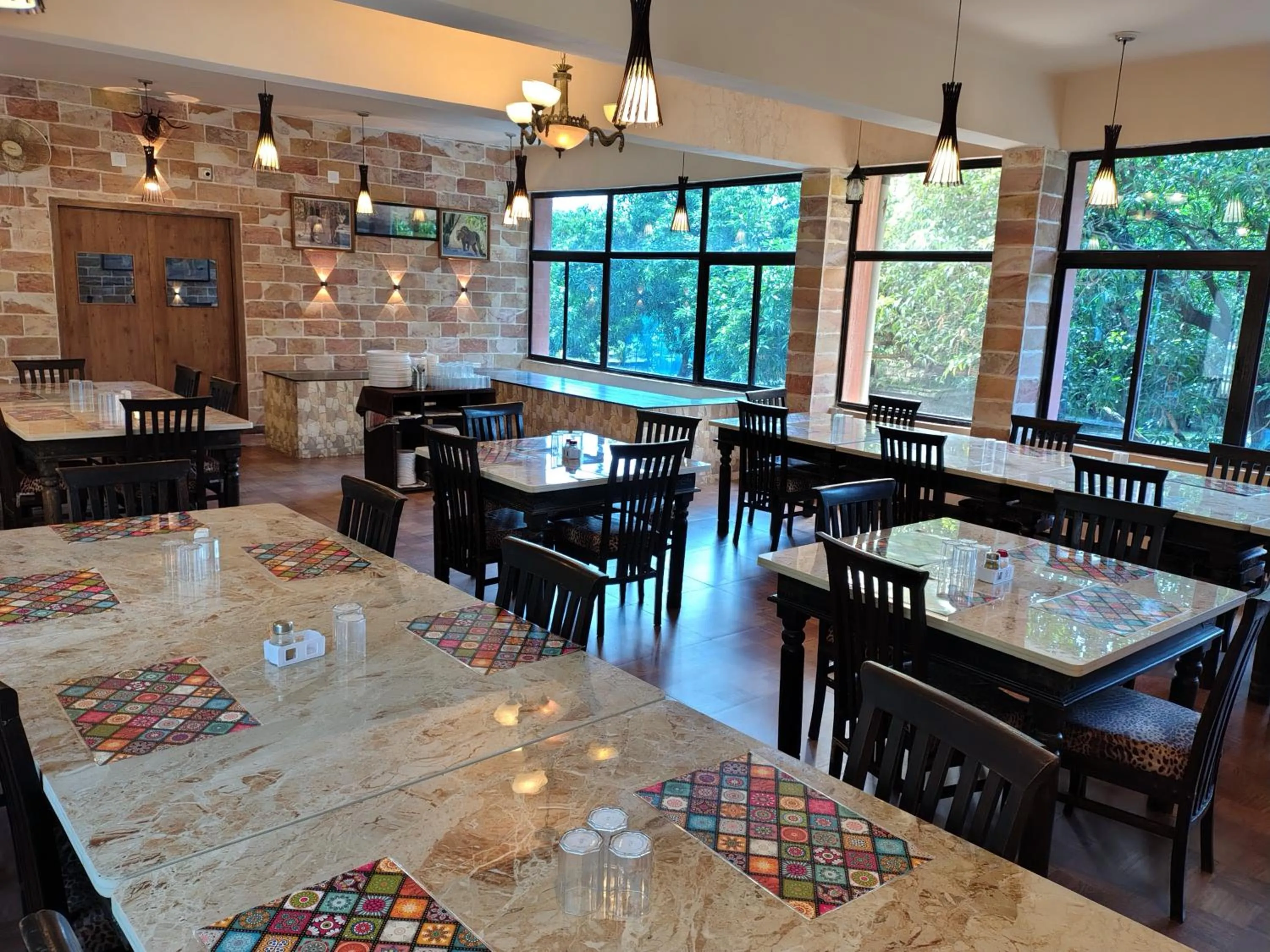 Restaurant/places to eat in Gir Lions Paw Resort with Swimming Pool