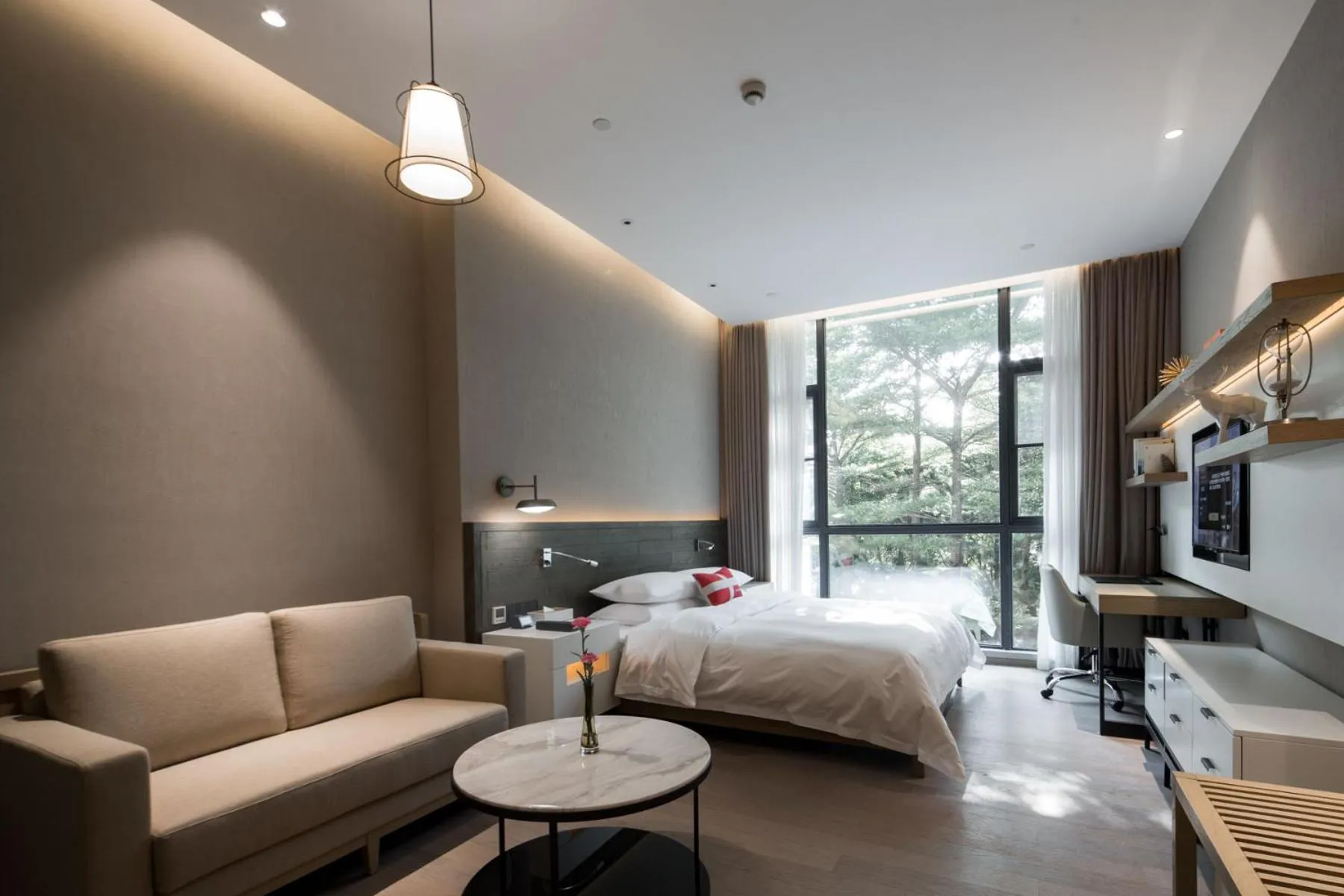 Photo of the whole room, Bed in Swisstouches Guangzhou Hotel Residences