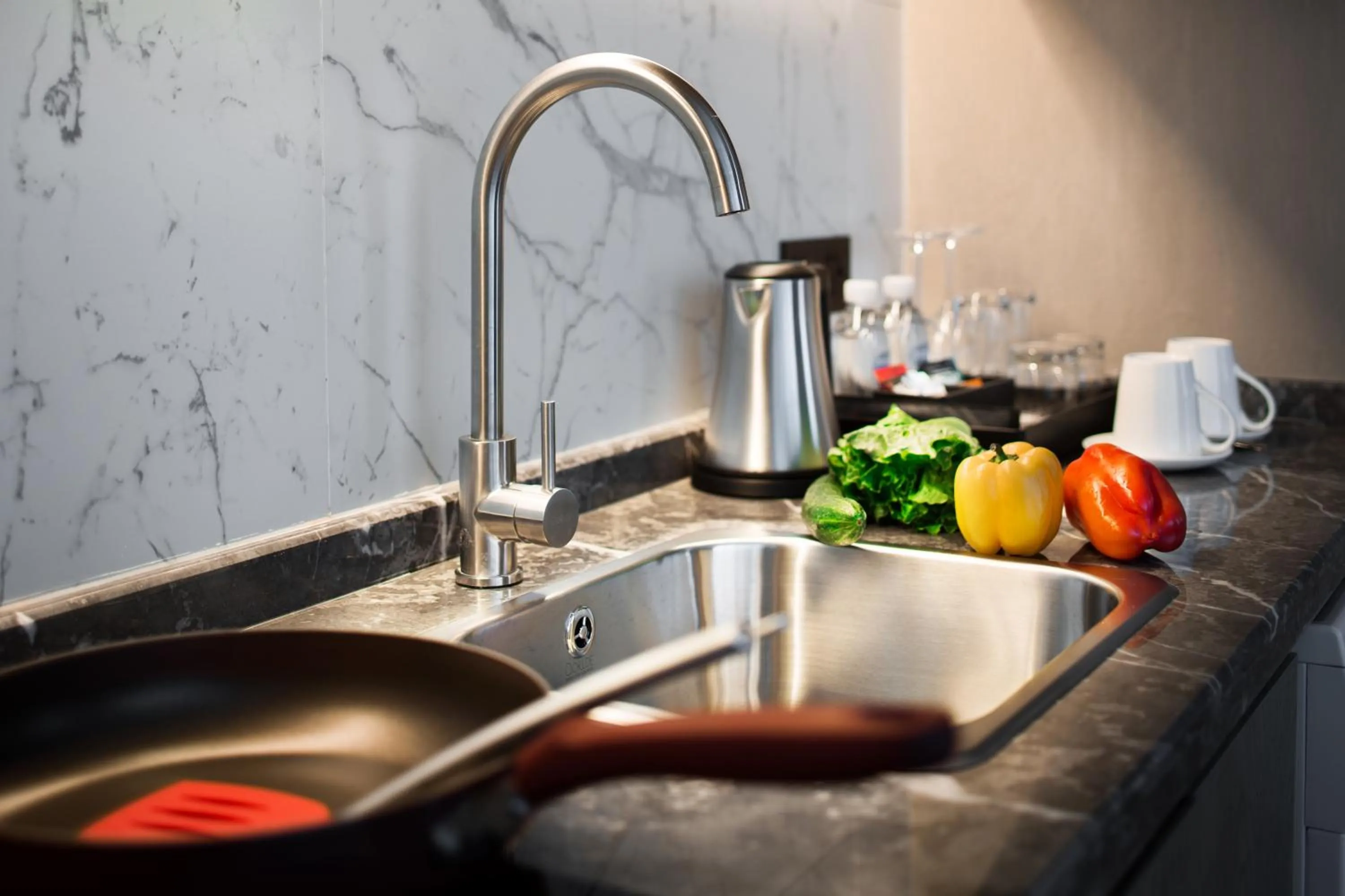 Kitchen or kitchenette in Swisstouches Guangzhou Hotel Residences