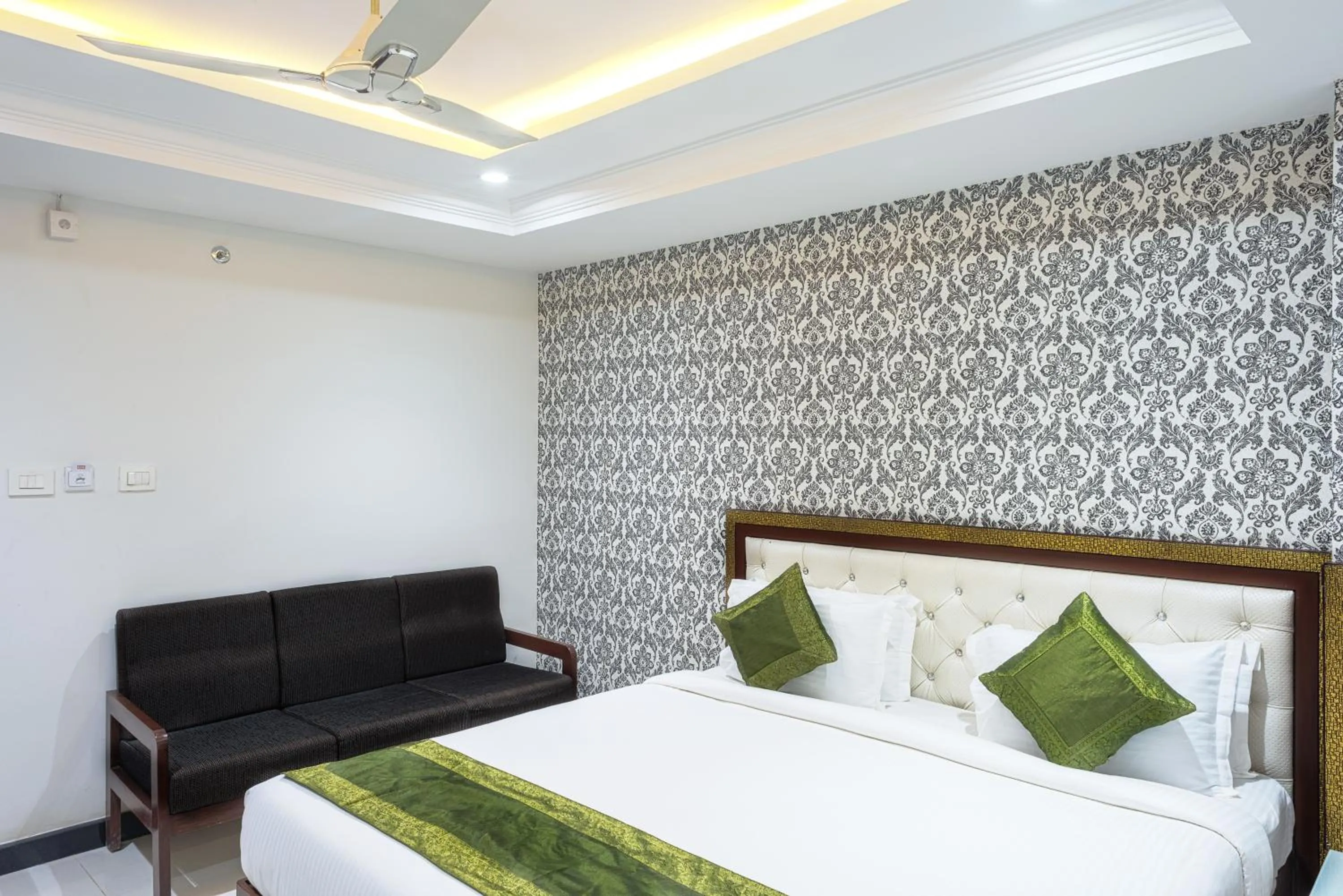 Bedroom, Bed in Treebo Empire