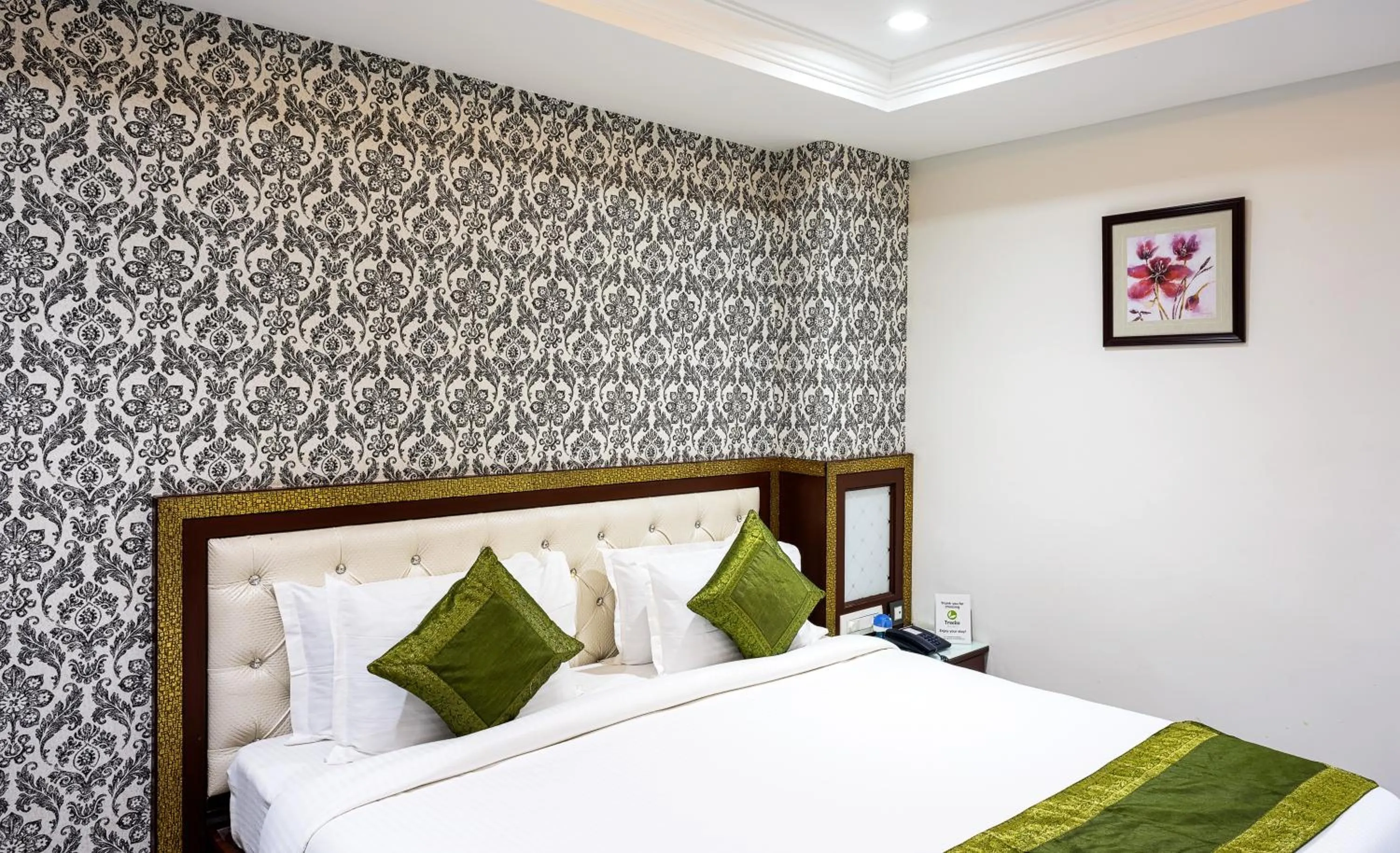 Bedroom, Bed in Treebo Empire