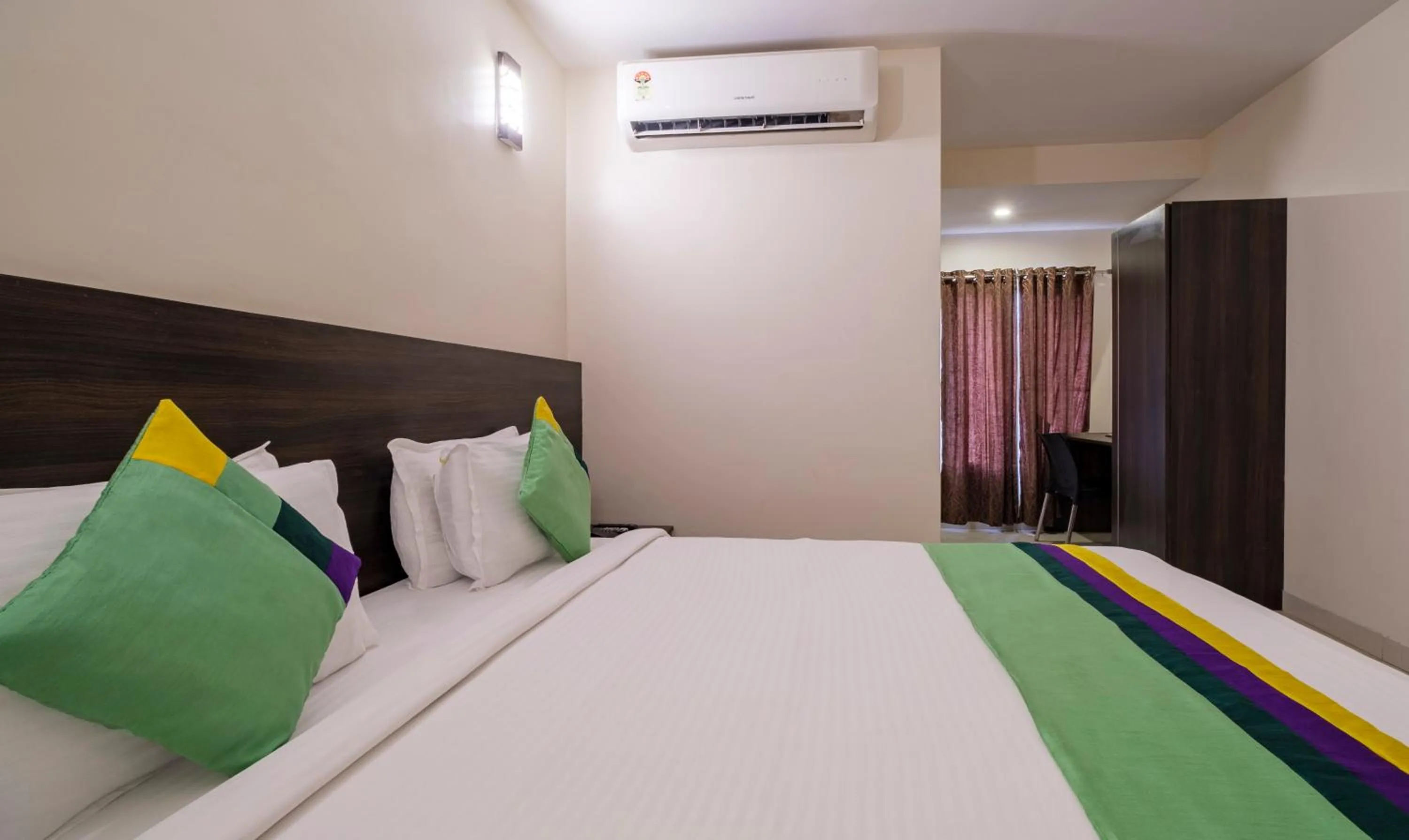 Bedroom, Bed in Treebo MVP Grand