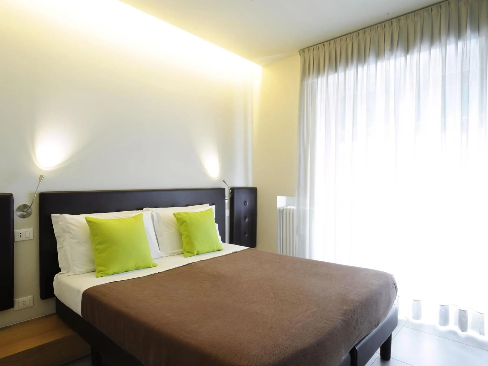 Balcony/Terrace, Bed in Hotel Concordia