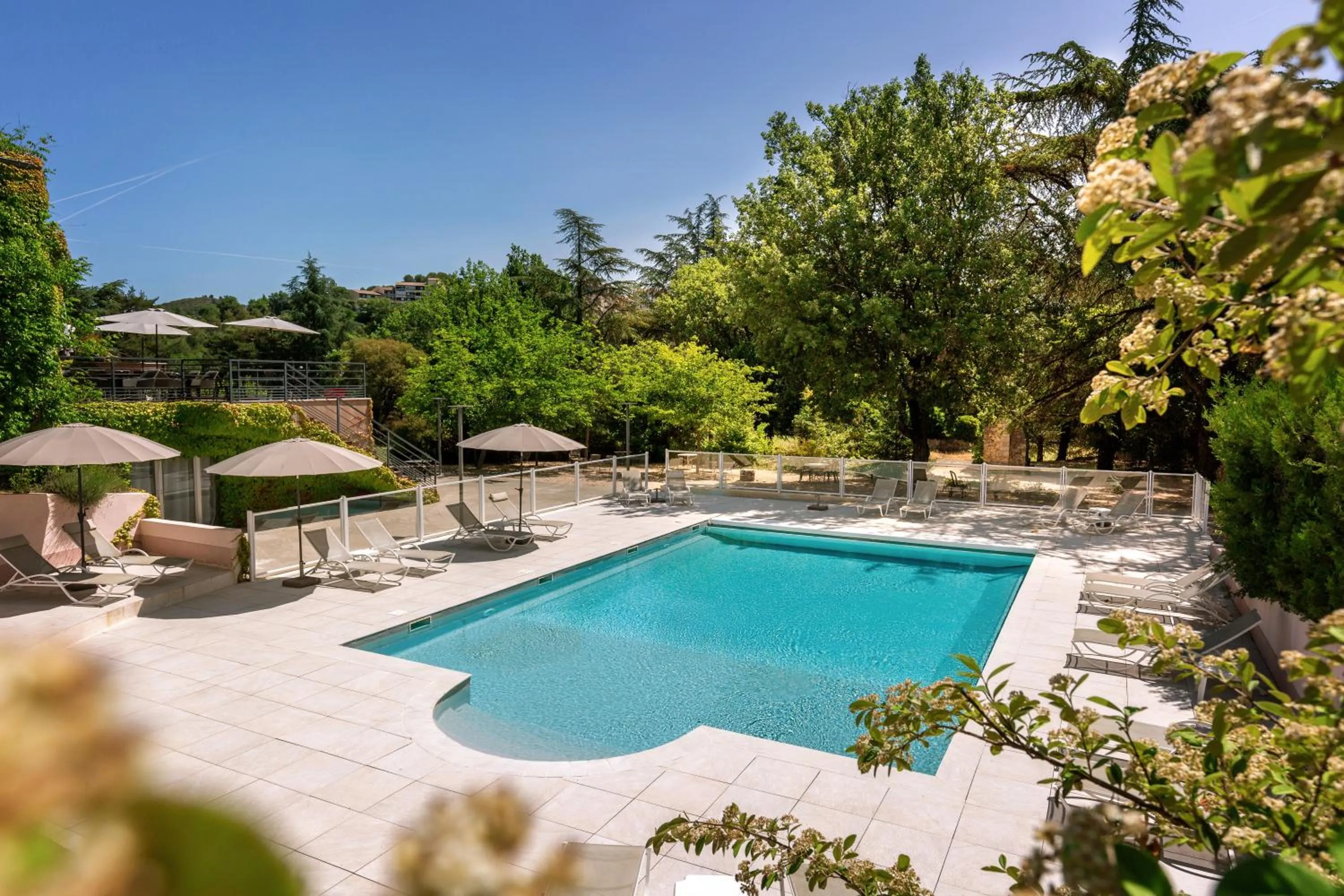 Swimming pool in Hôtel & Résidence Lou Paradou Gréoux Les Bains
