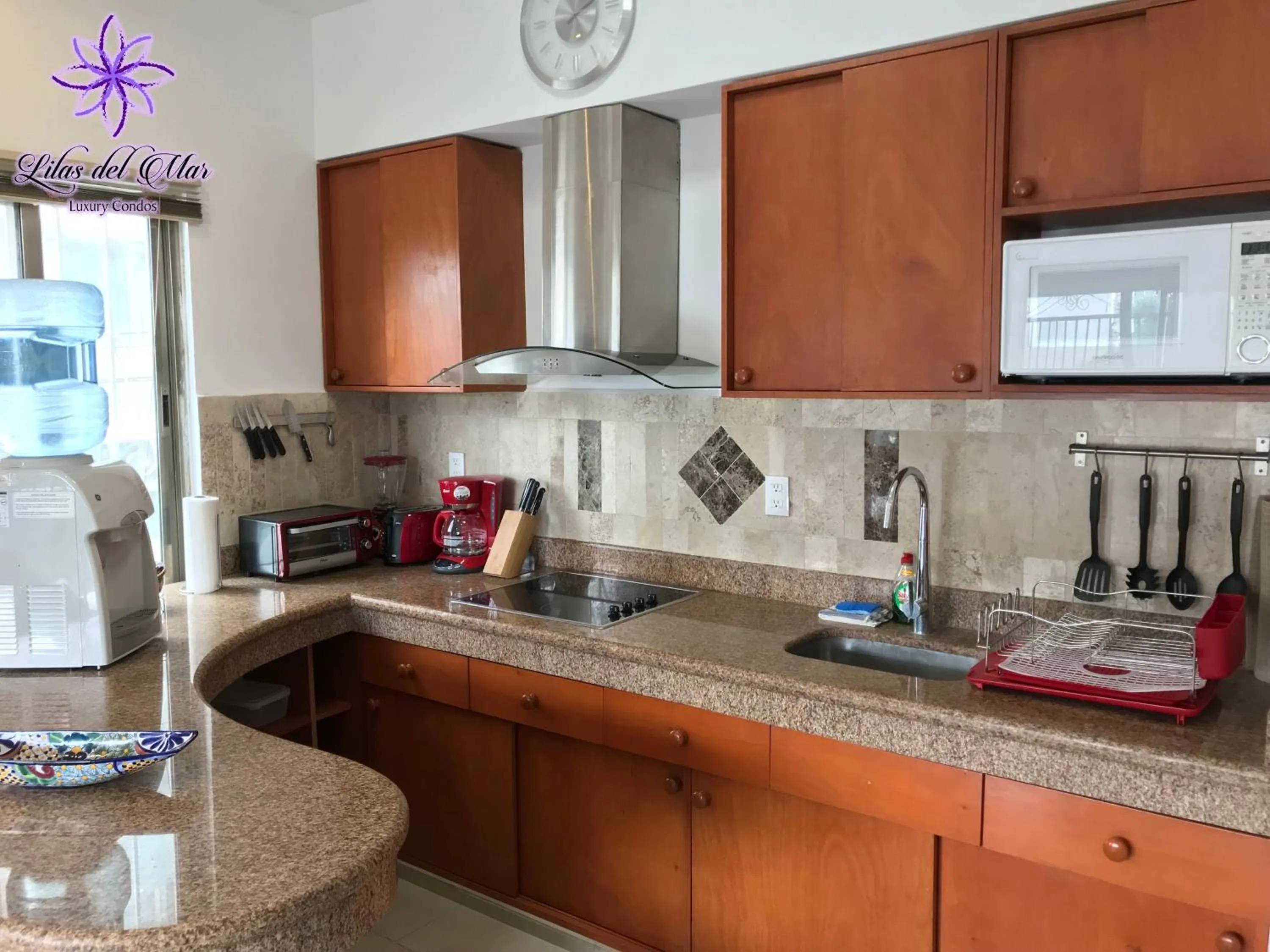 Kitchen or kitchenette in Lilas del Mar Apartments