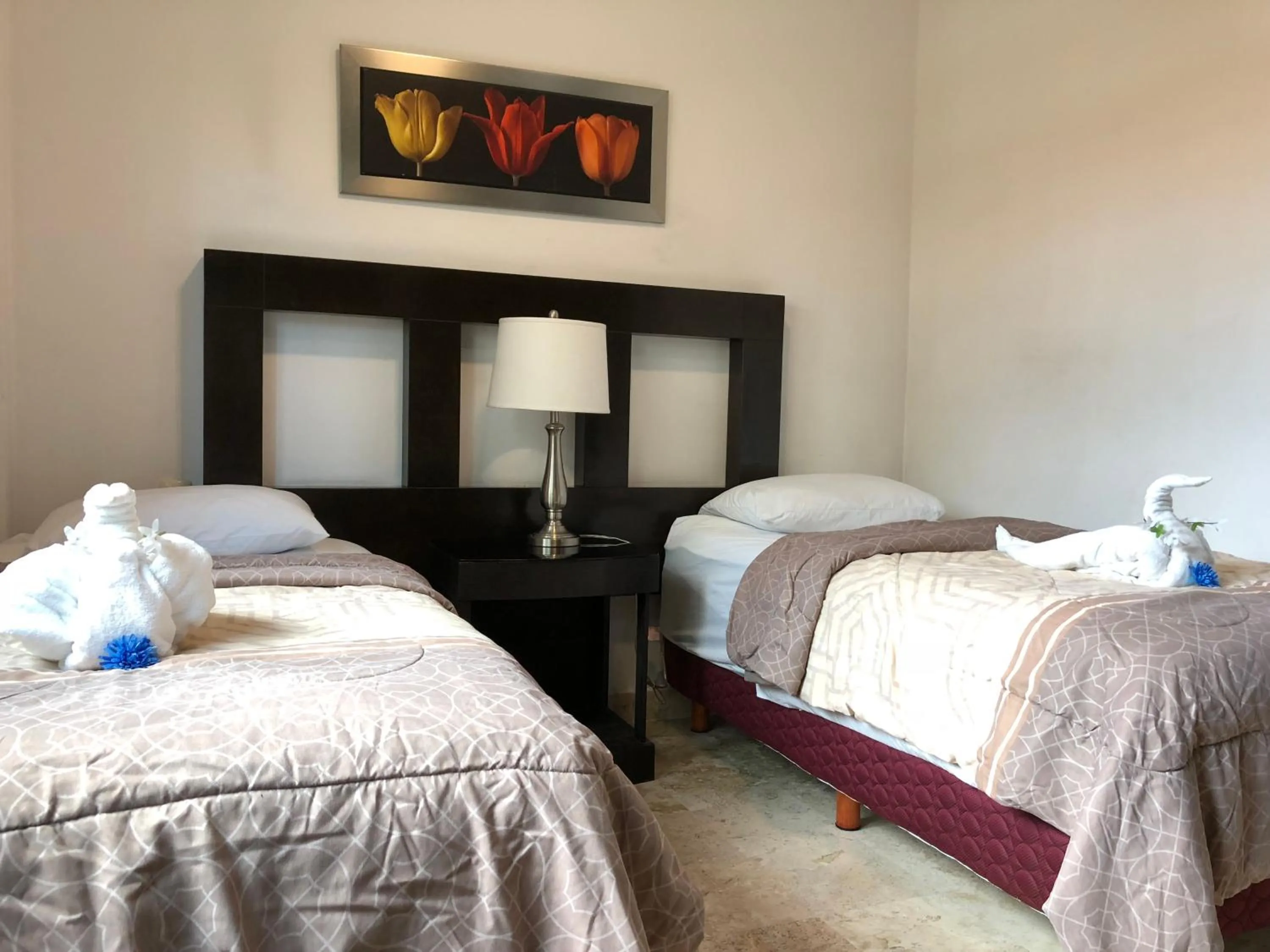 Bed in Lilas del Mar Apartments