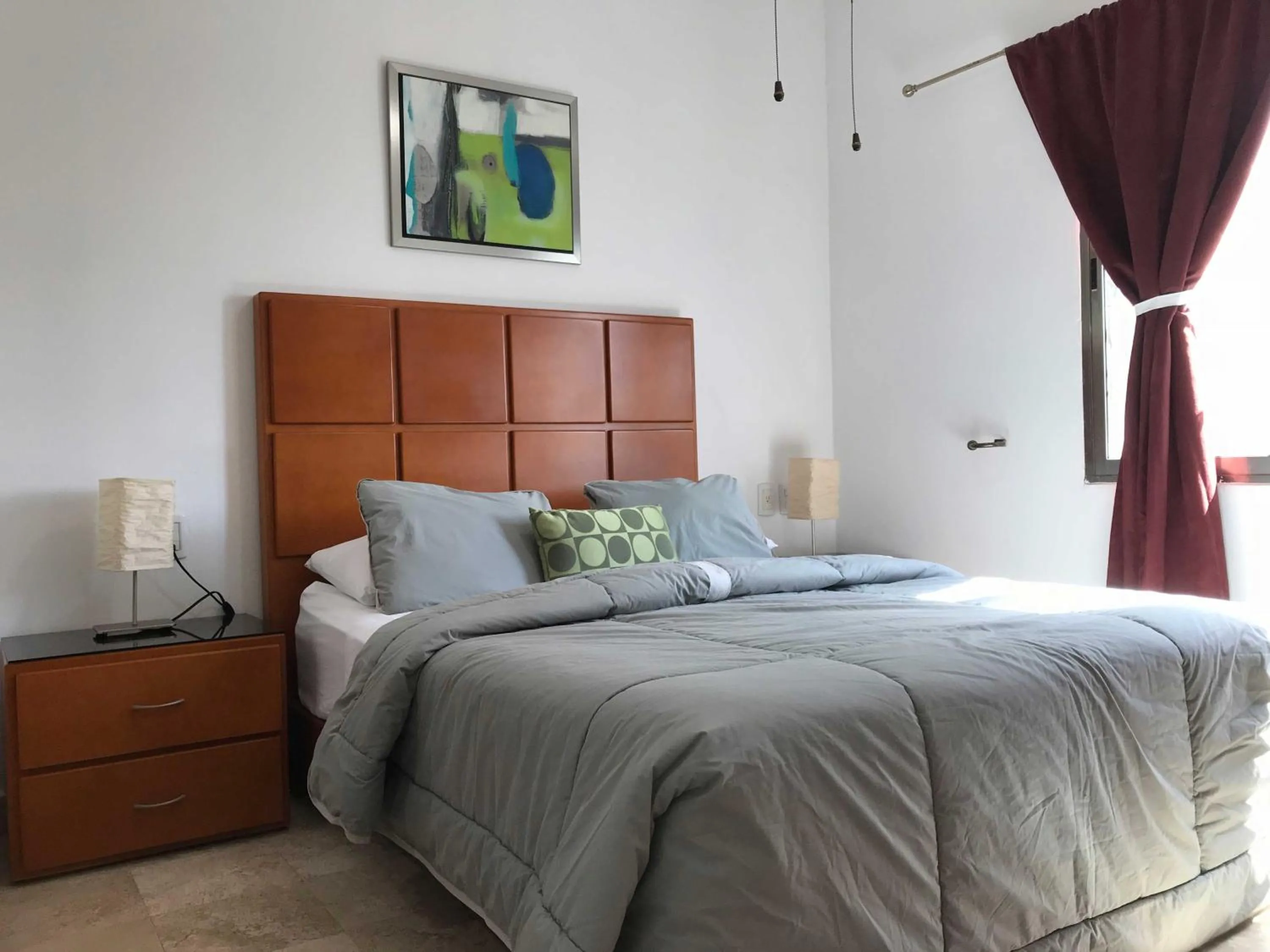 Bed in Lilas del Mar Apartments
