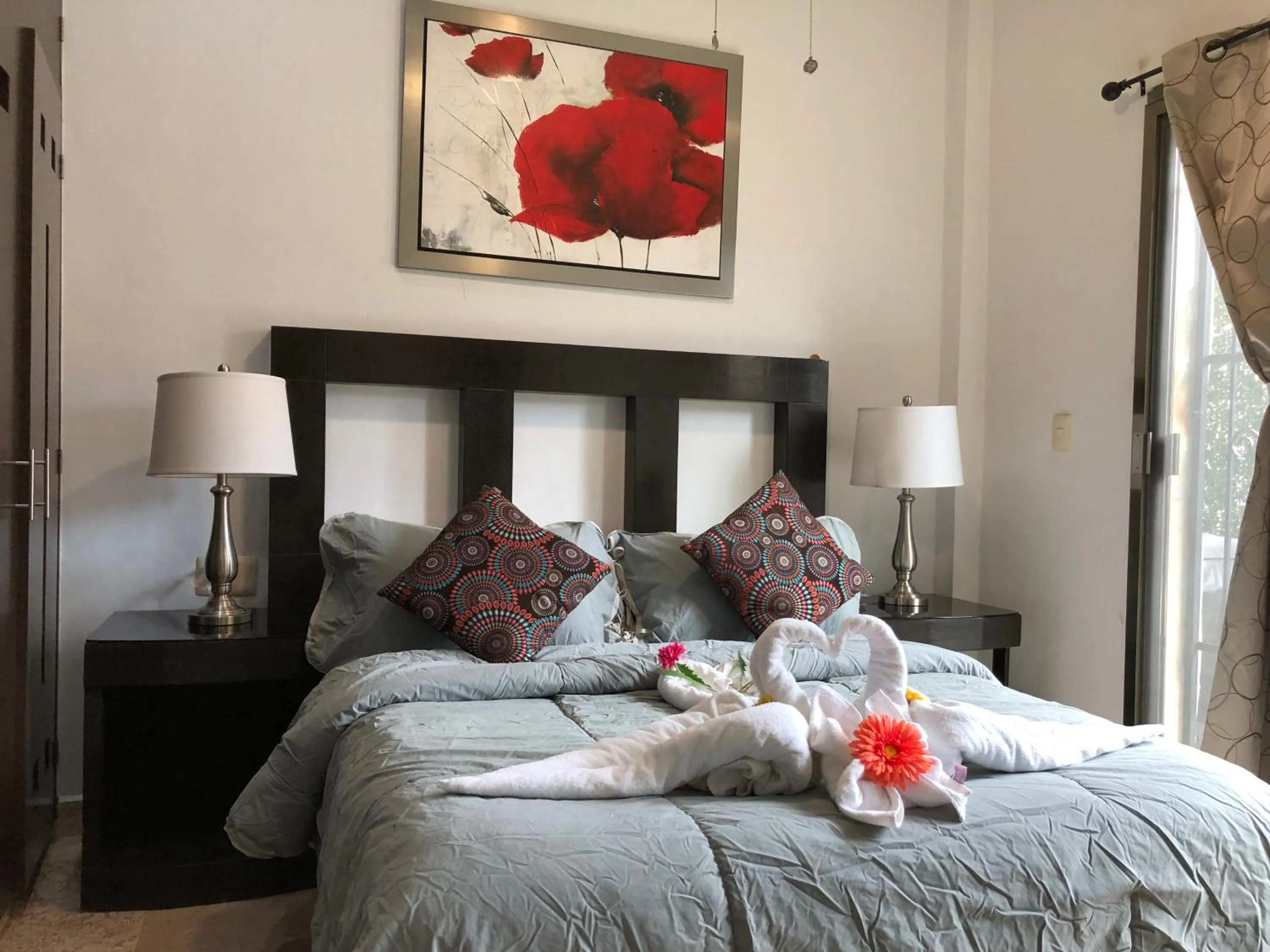 Bed in Lilas del Mar Apartments