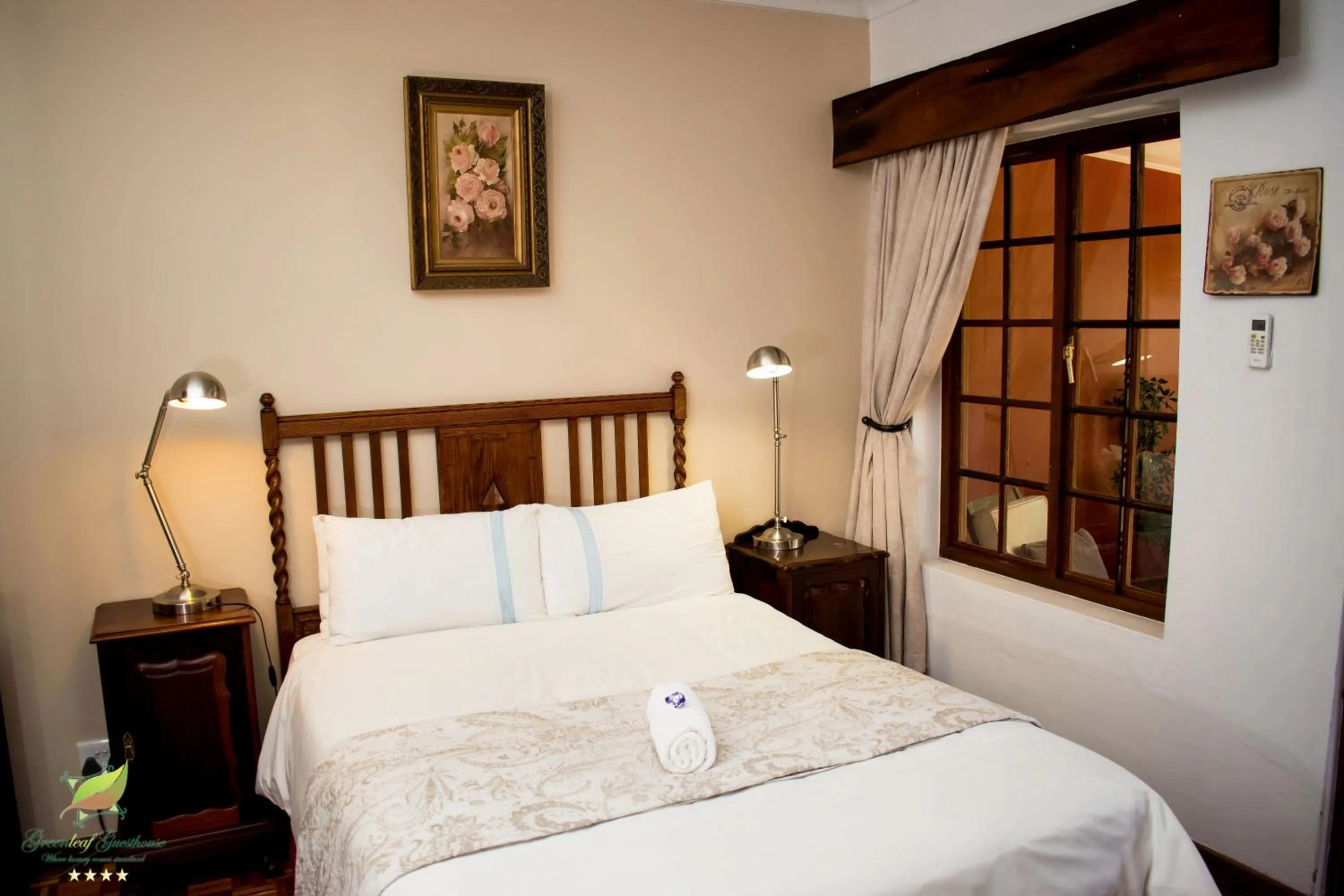 Bed in Greenleaf Guest Lodge