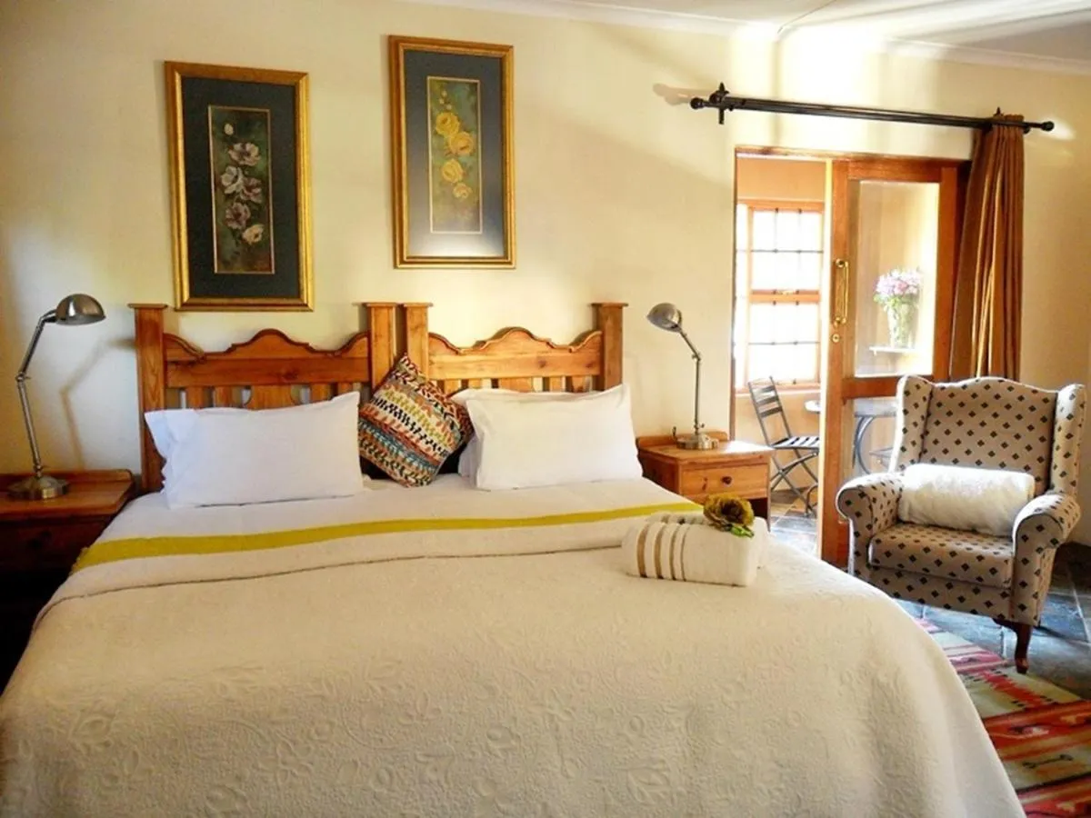 Bed in Greenleaf Guest Lodge