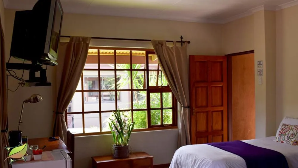 Bedroom, Bed in Greenleaf Guest Lodge