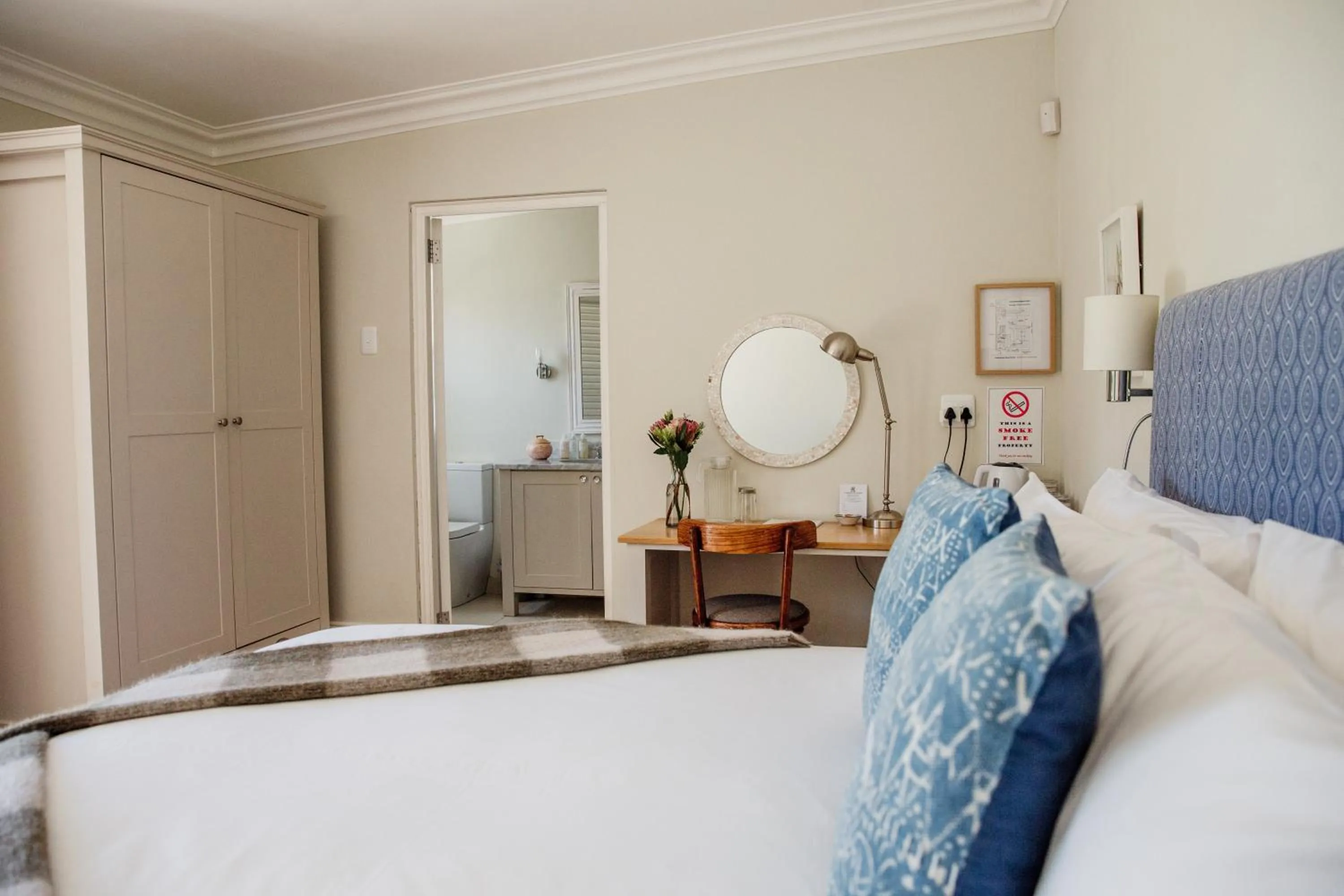 Photo of the whole room, Bed in Cornerstone Manor