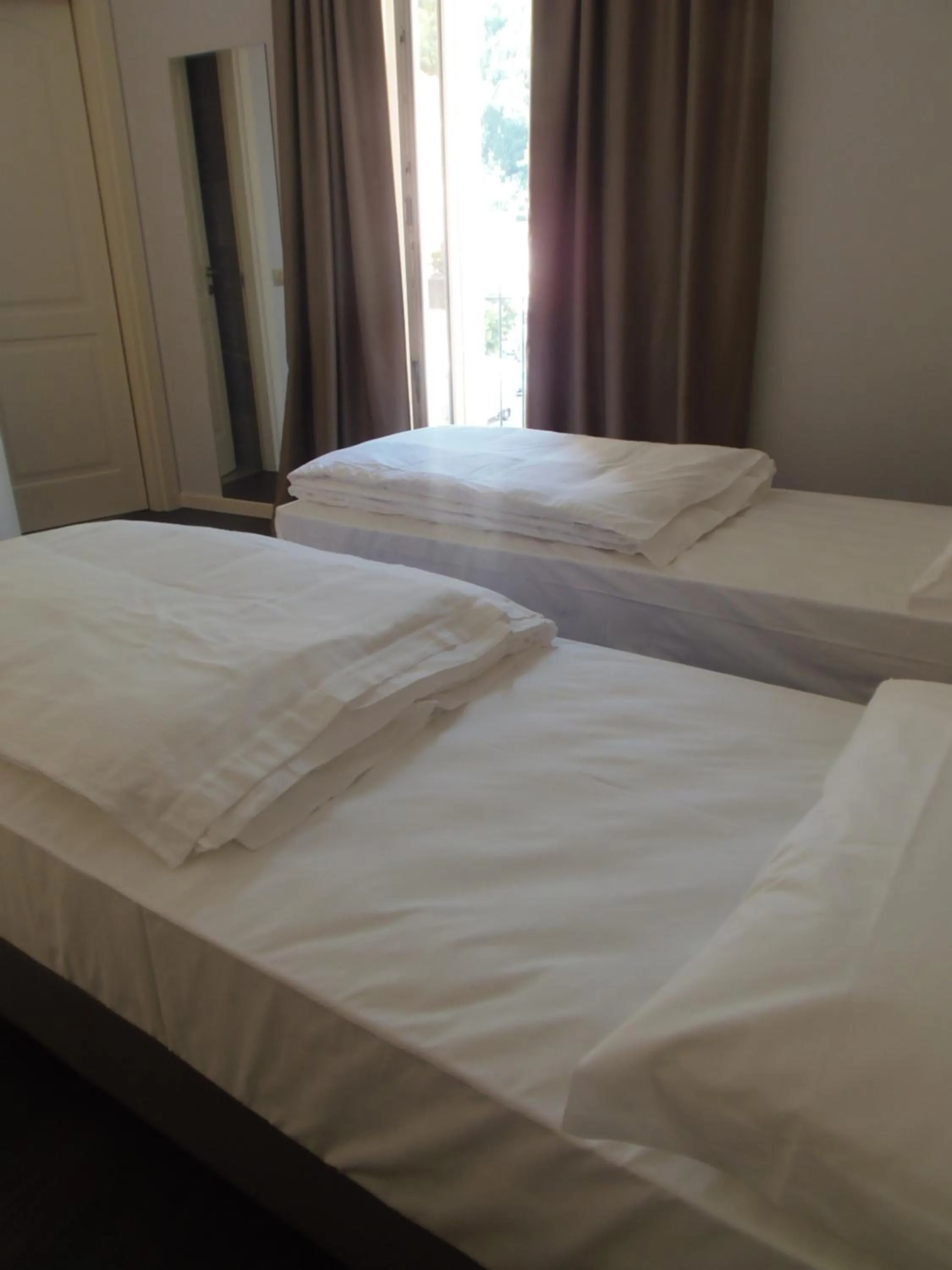 Bed in Albergo Dongo