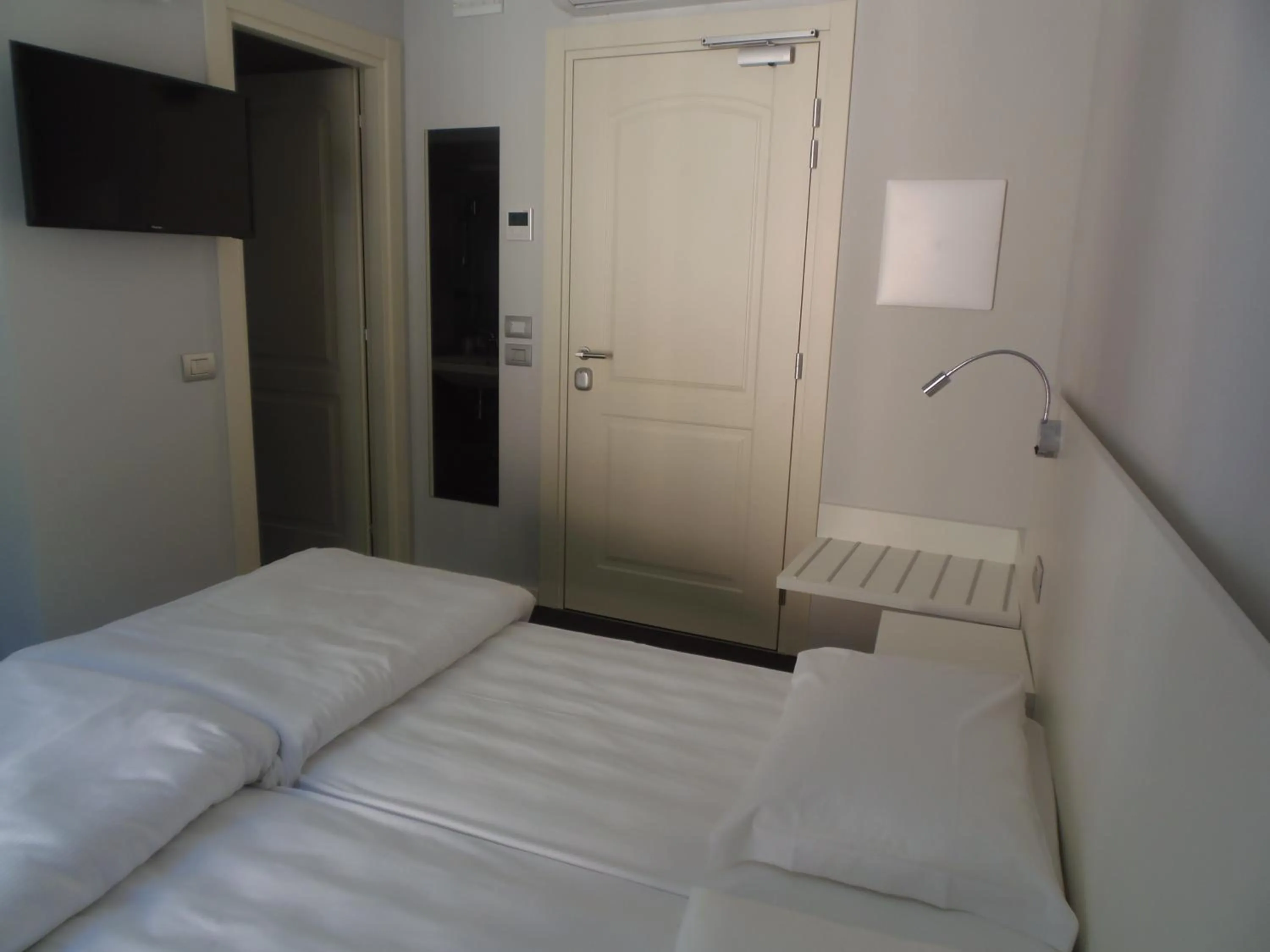 Bed in Albergo Dongo