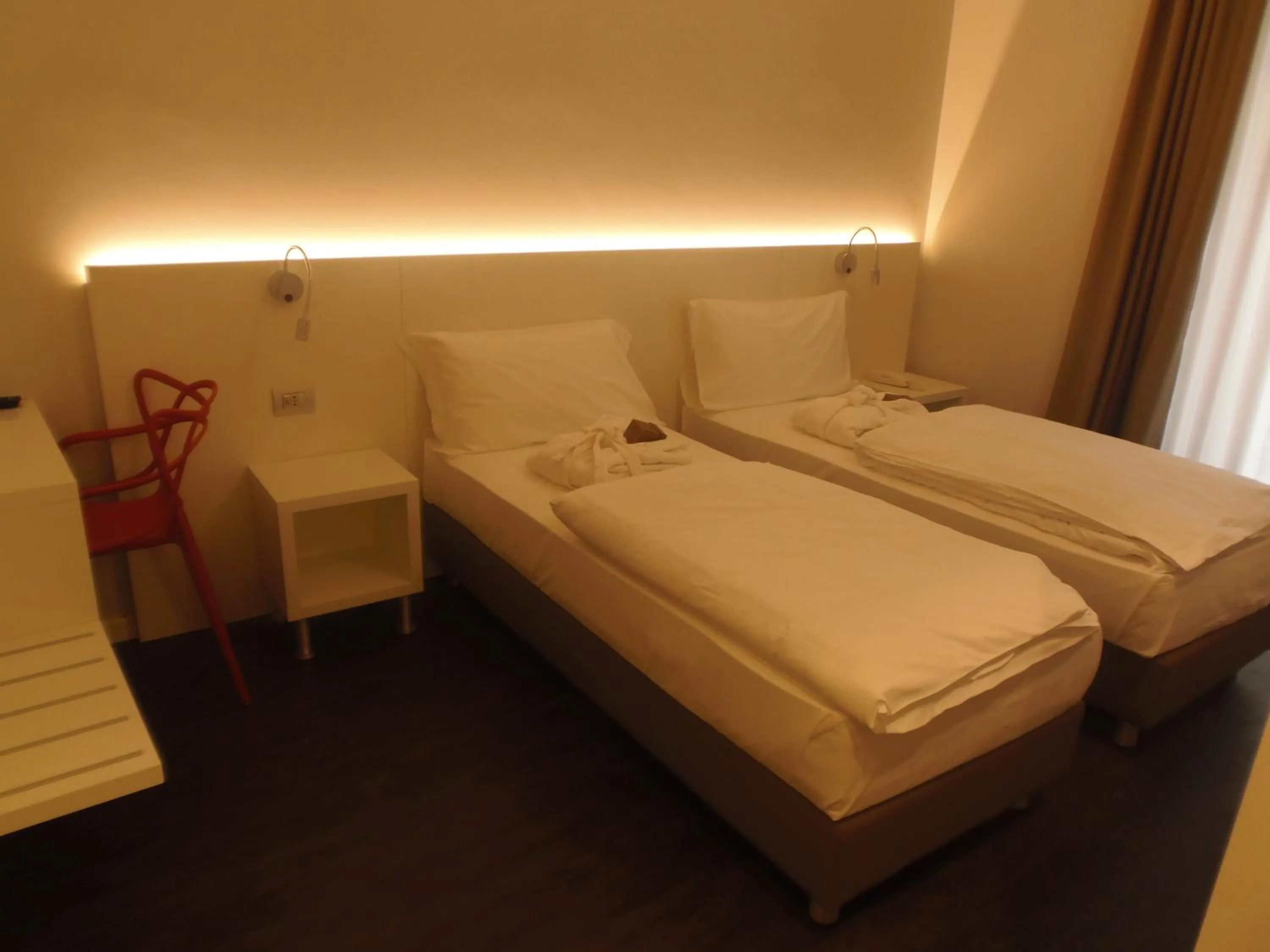 Bed in Albergo Dongo