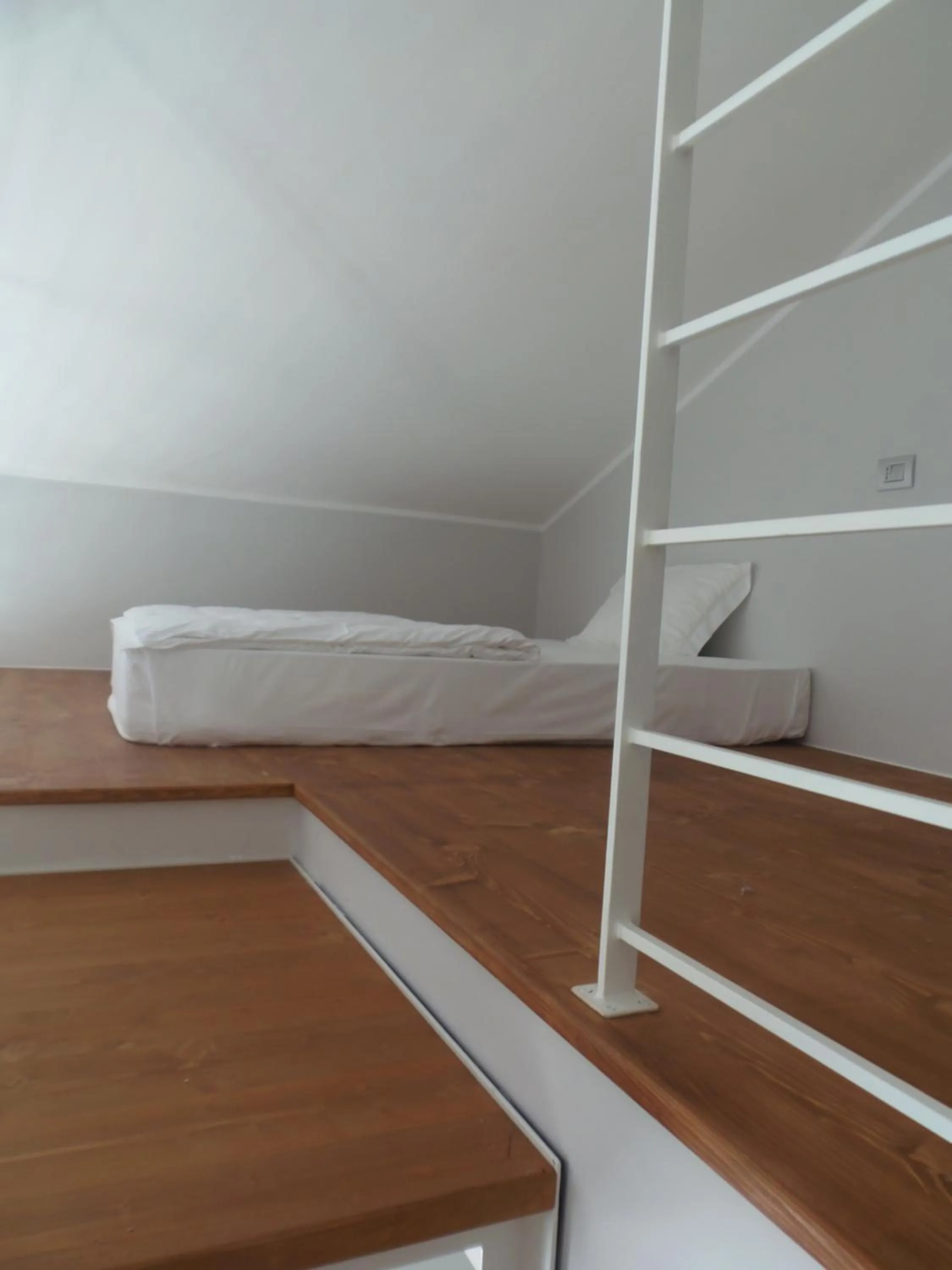 Bed in Albergo Dongo