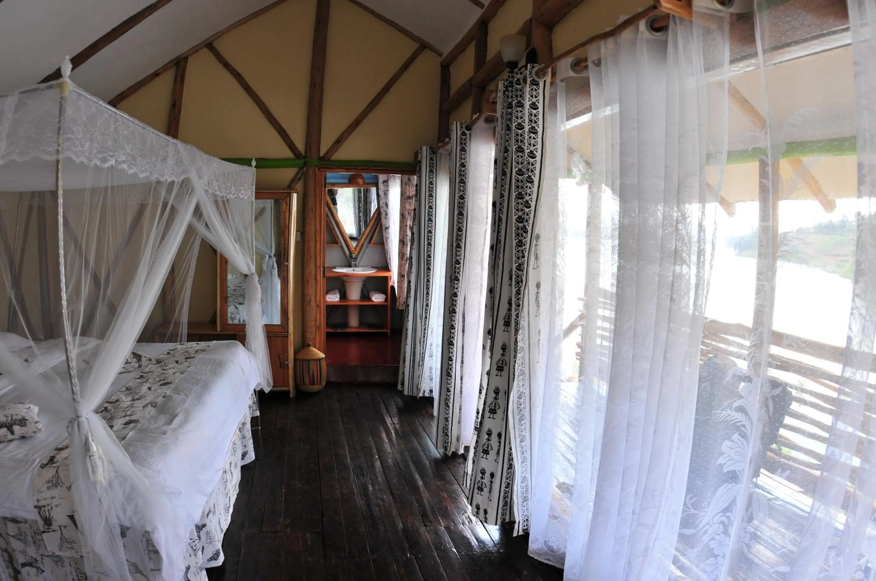 Bed in Lake Bunyonyi Rock Resort