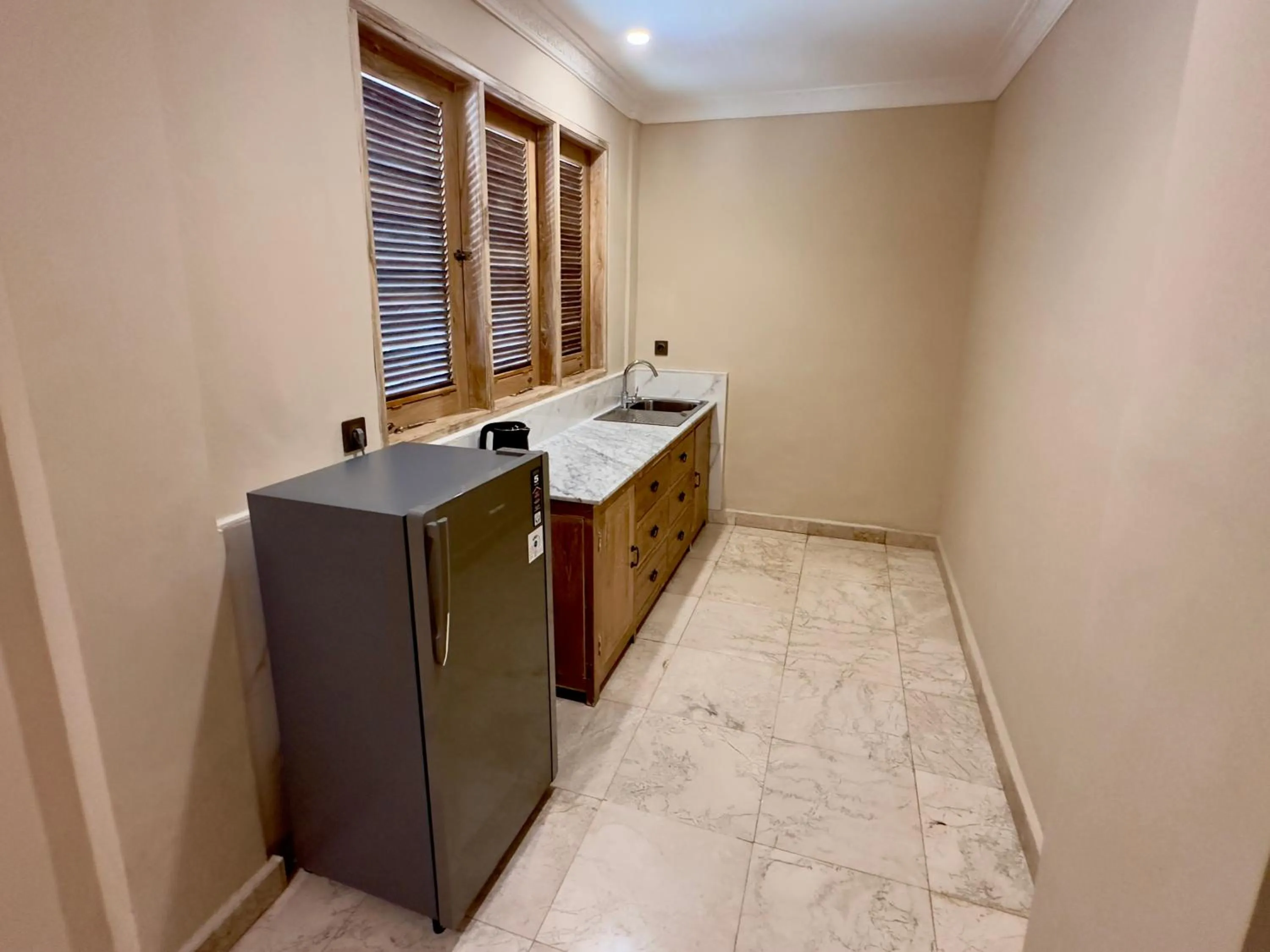 Kitchen or kitchenette in Honeymoon Guesthouse