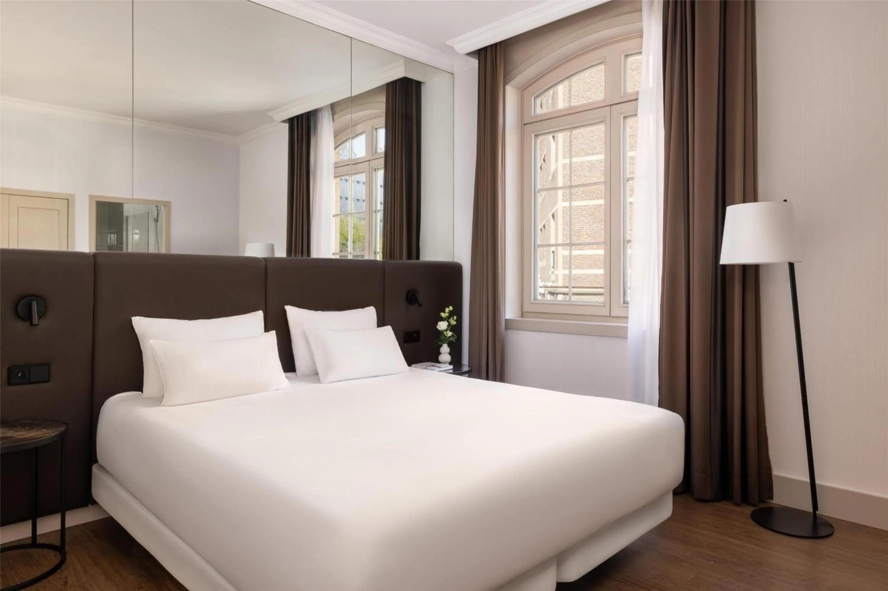 Photo of the whole room, Bed in NH Brussels Carrefour de L’Europe