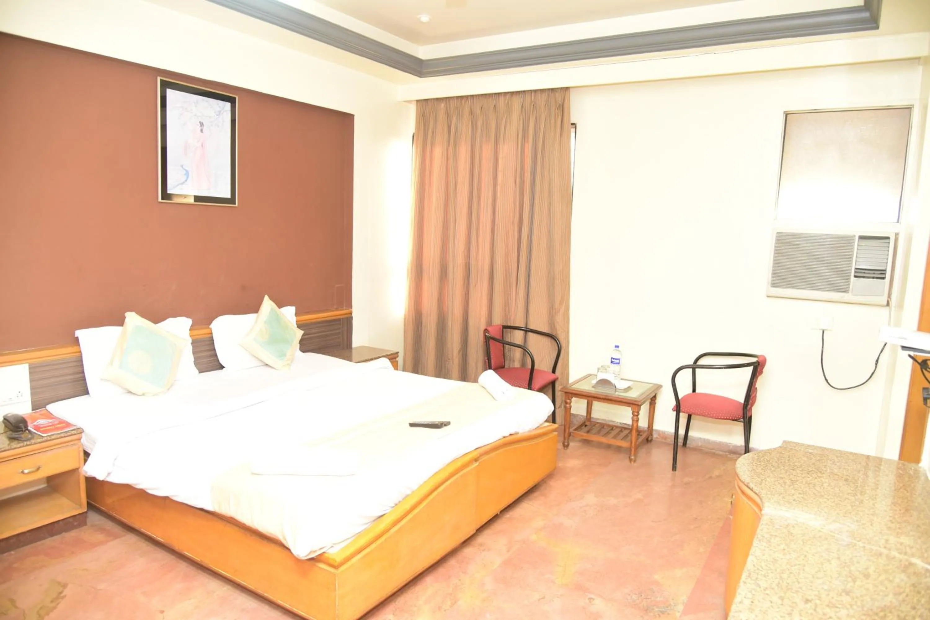 Bed in Celebrations Inn Pune