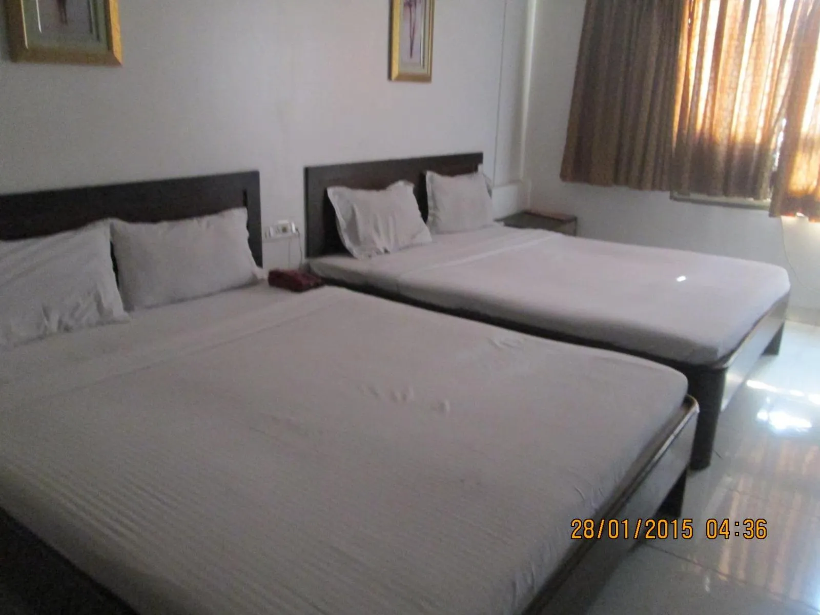Bed in Celebrations Inn Pune